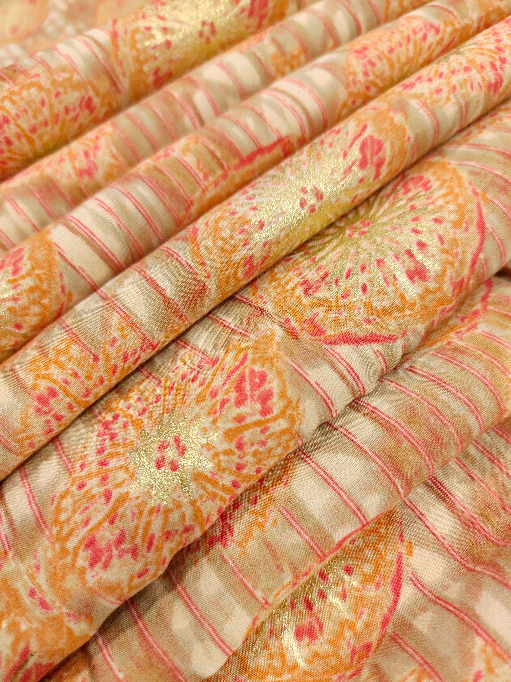 Muslin fabric with beige base with red and gold digital print