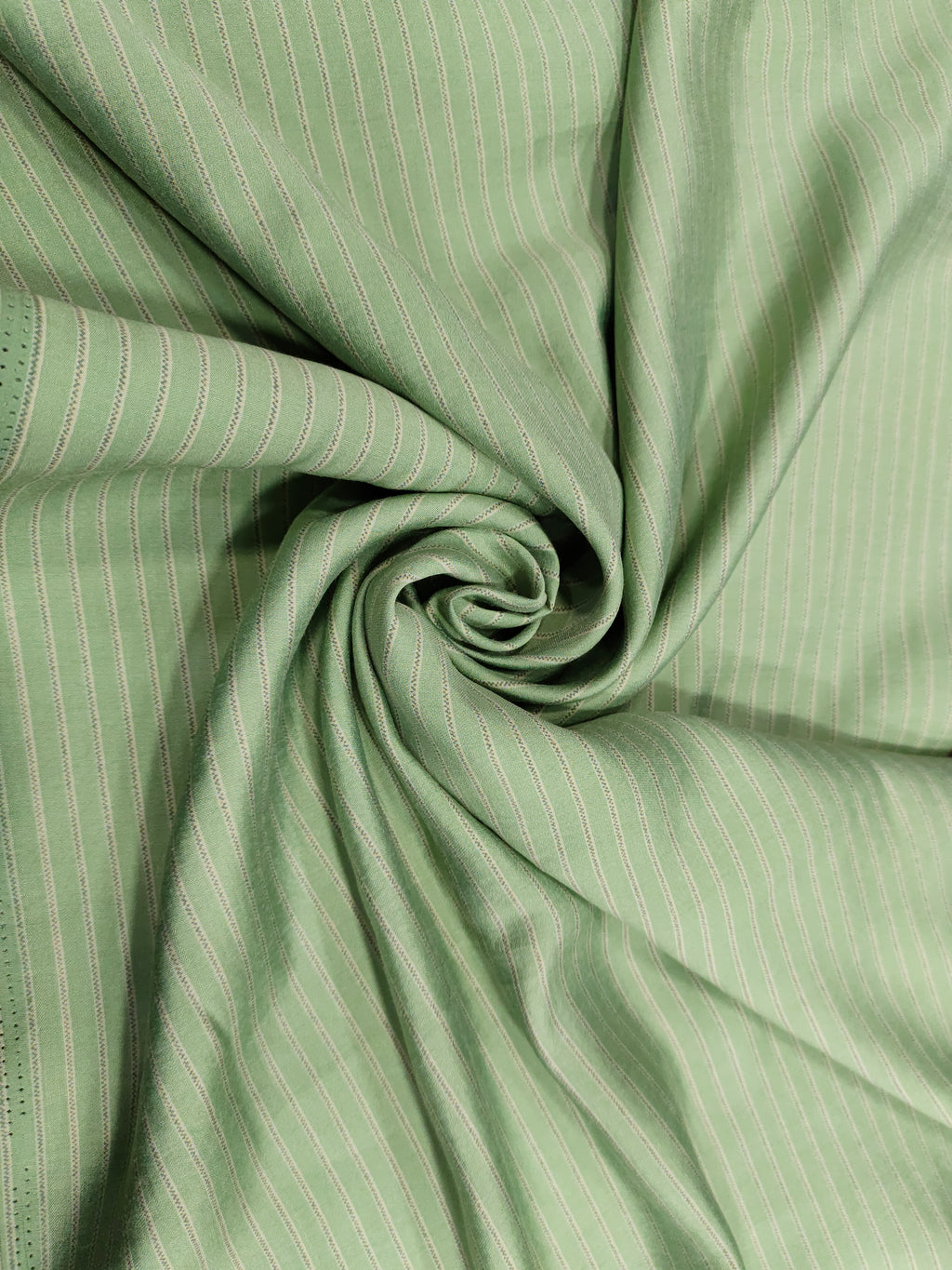 Sea green muslin fabric with beige stripes