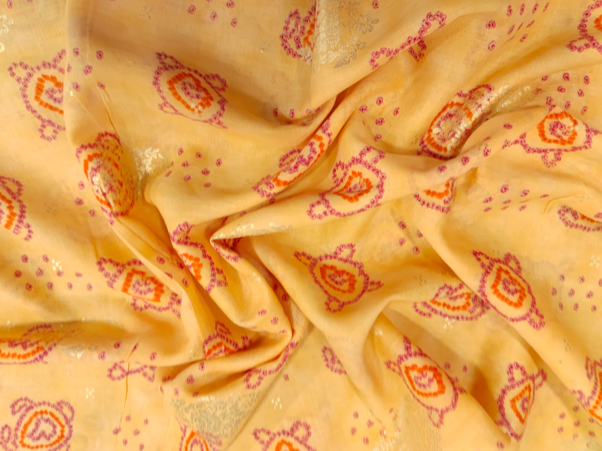 Yellow cotton silk fabric with red and gold print