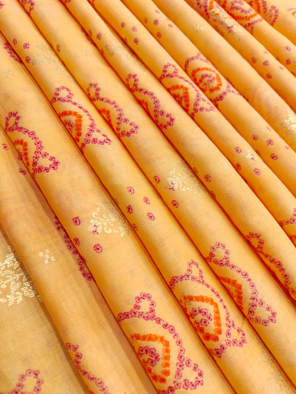 Yellow cotton silk fabric with red and gold print