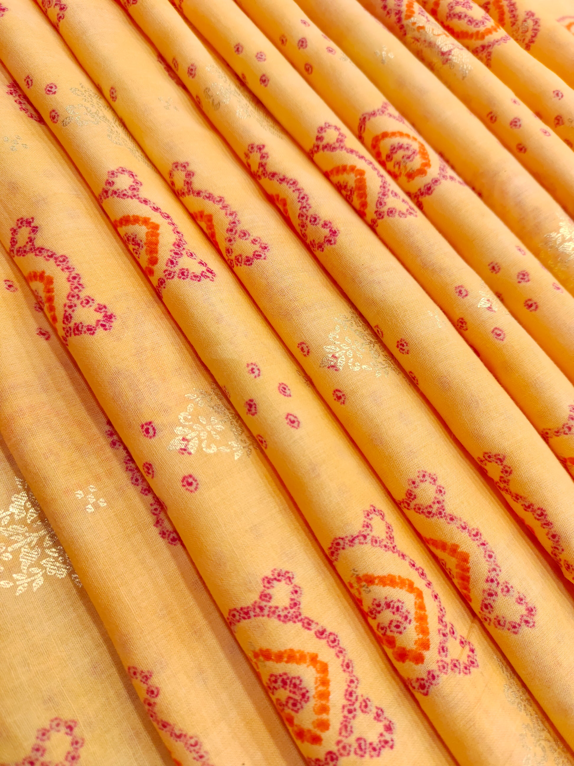 Yellow cotton silk fabric with red and gold print