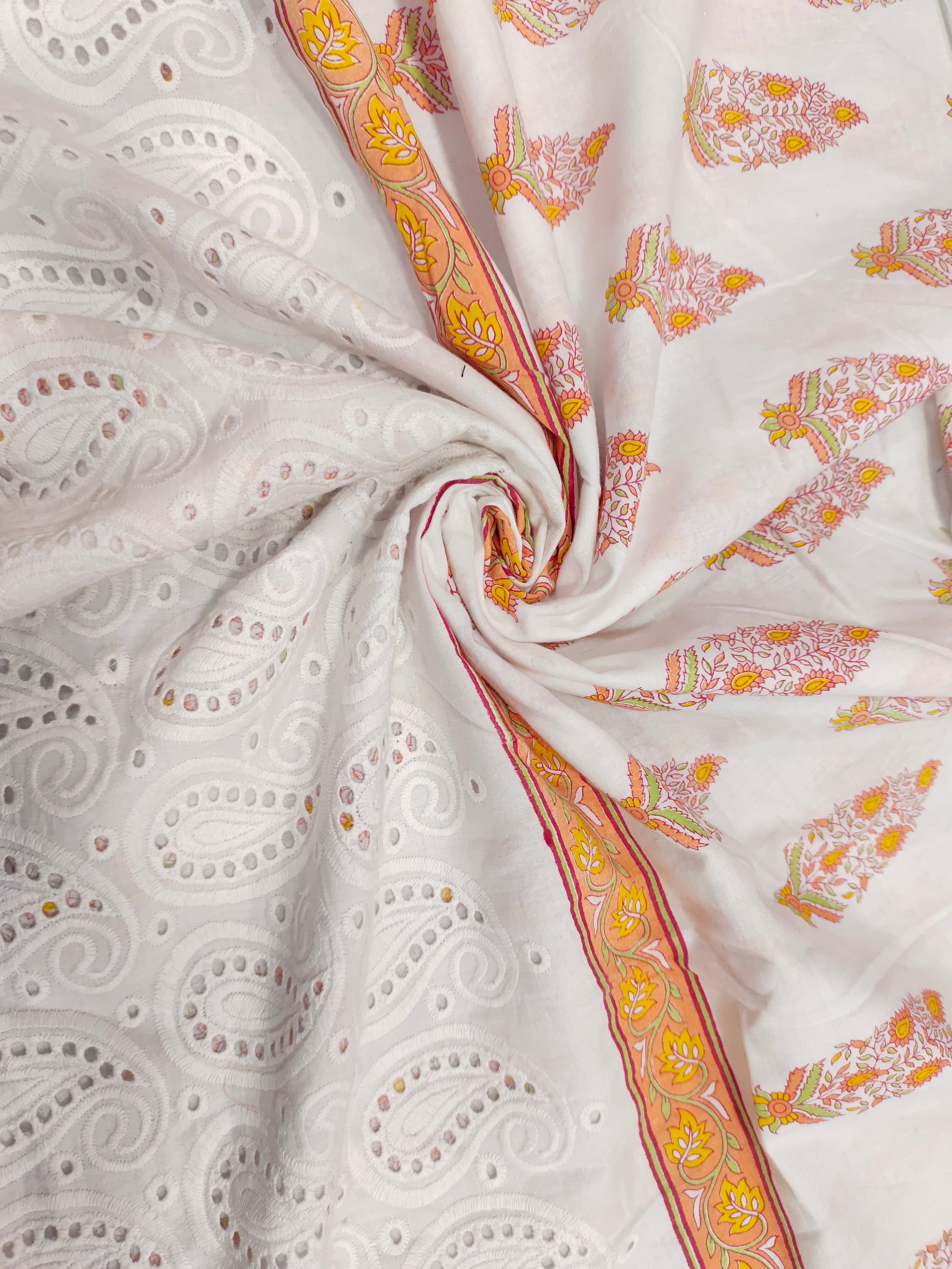 White cutwork daman fabric with orange print