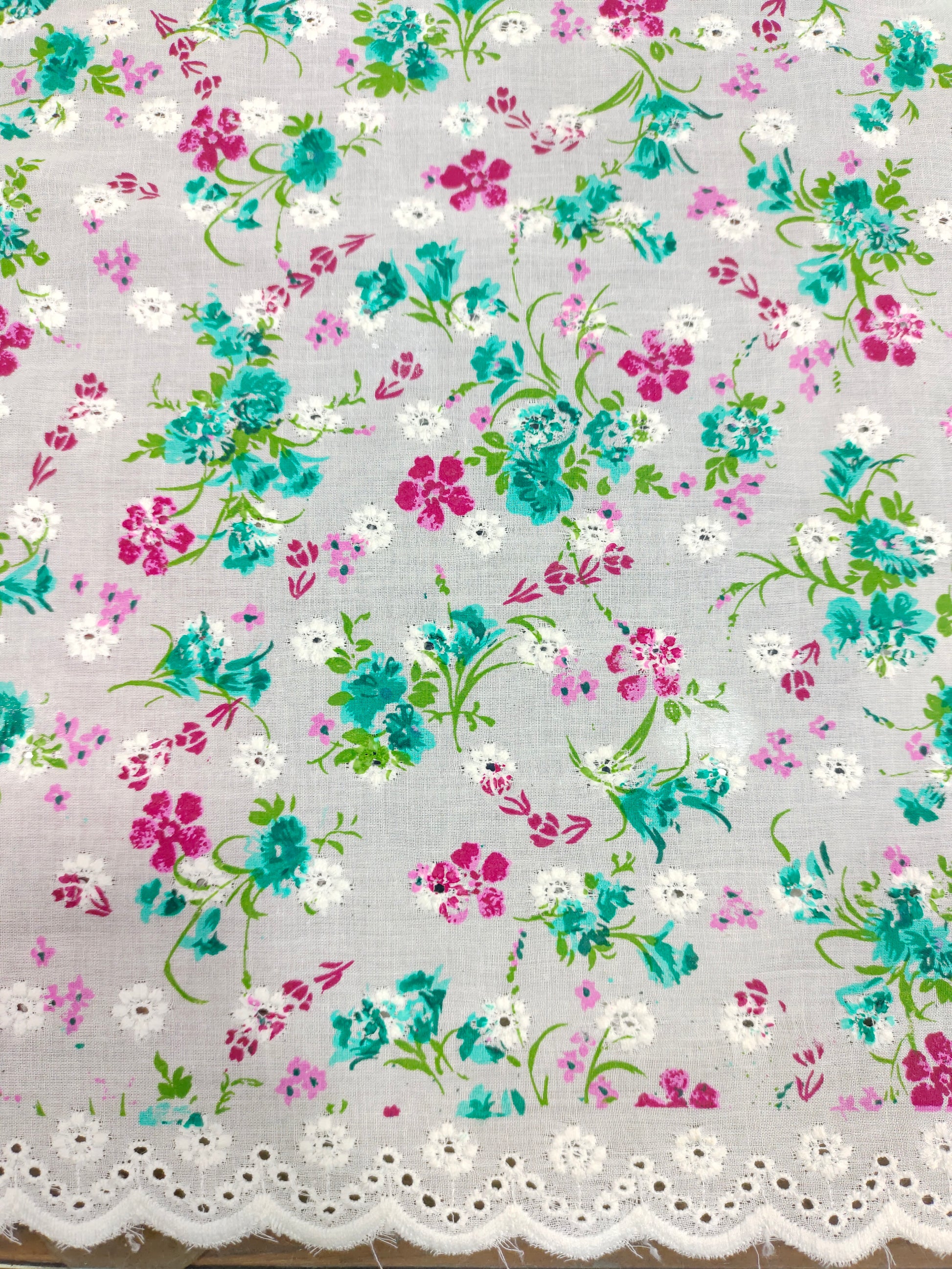 Offwhite embroidered fabric with green and pink print