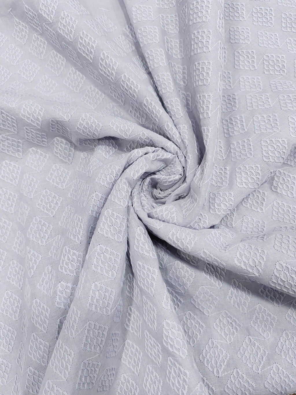 Grey embroidered fabric