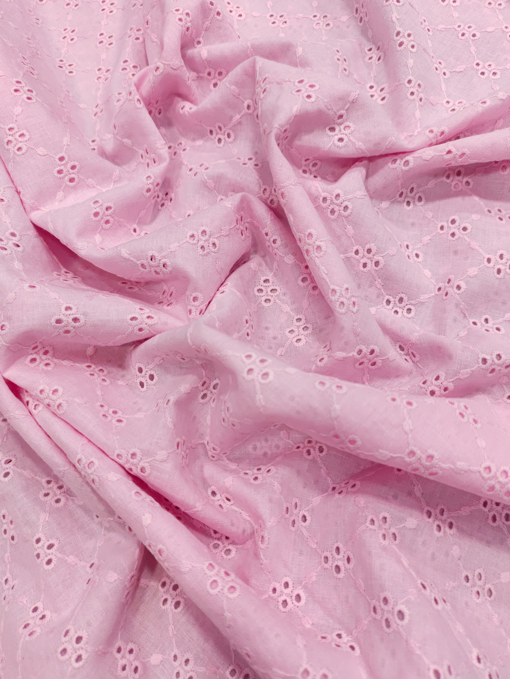 cotton fabric embroidery pink in color