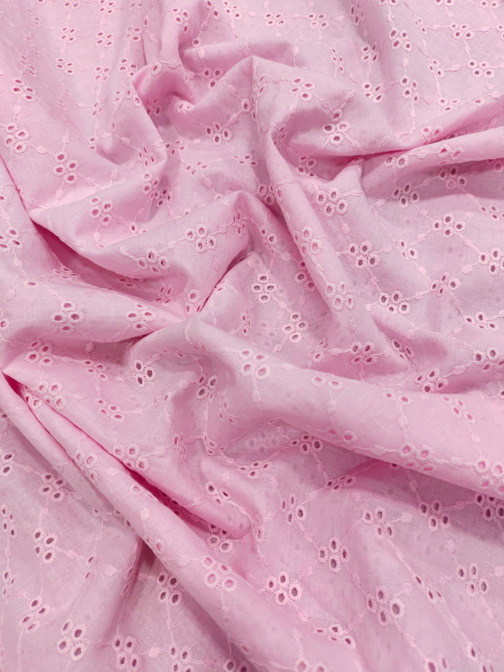 cotton fabric embroidery pink in color