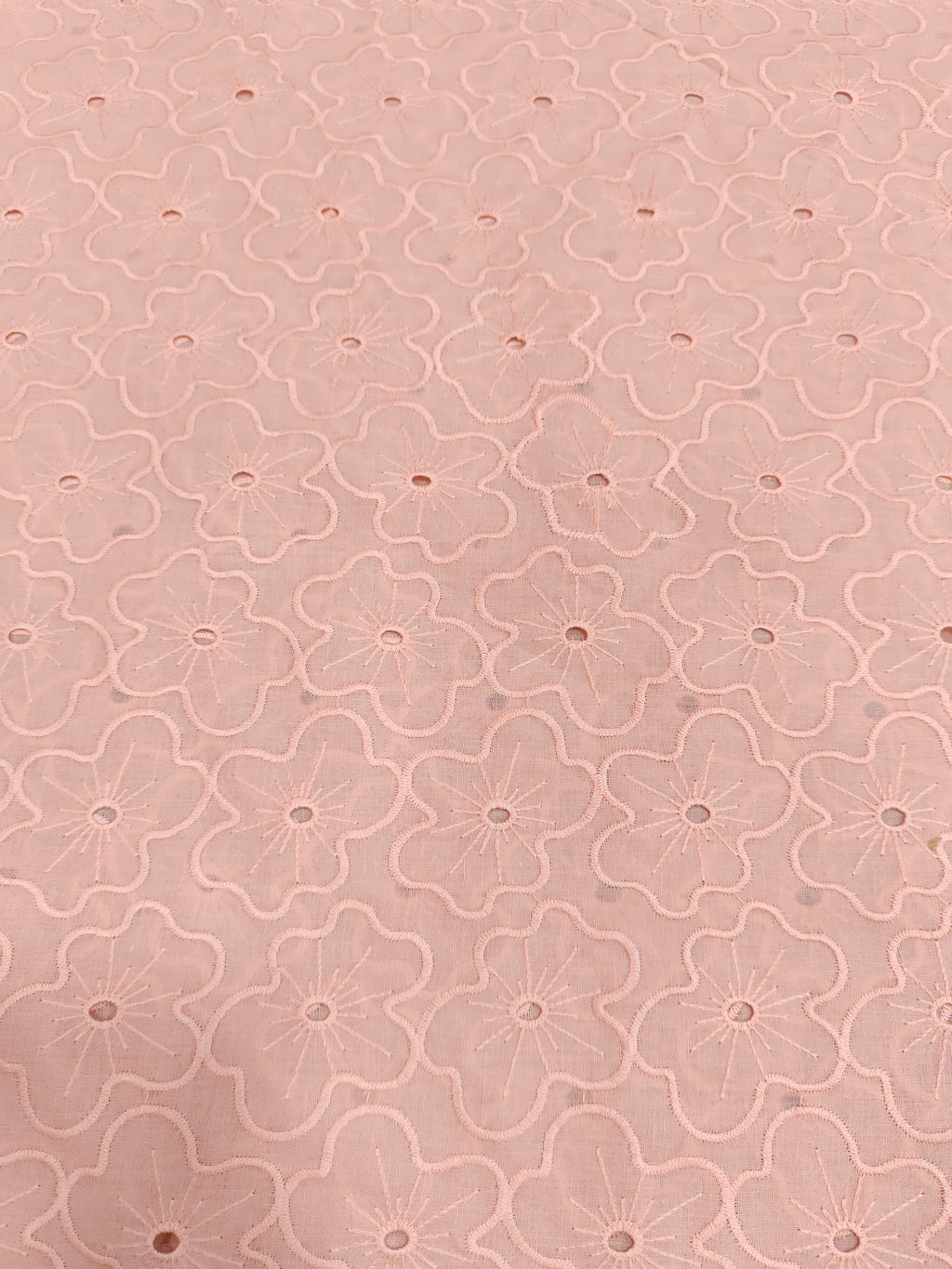 Peach cotton embroidery with small holes cut work