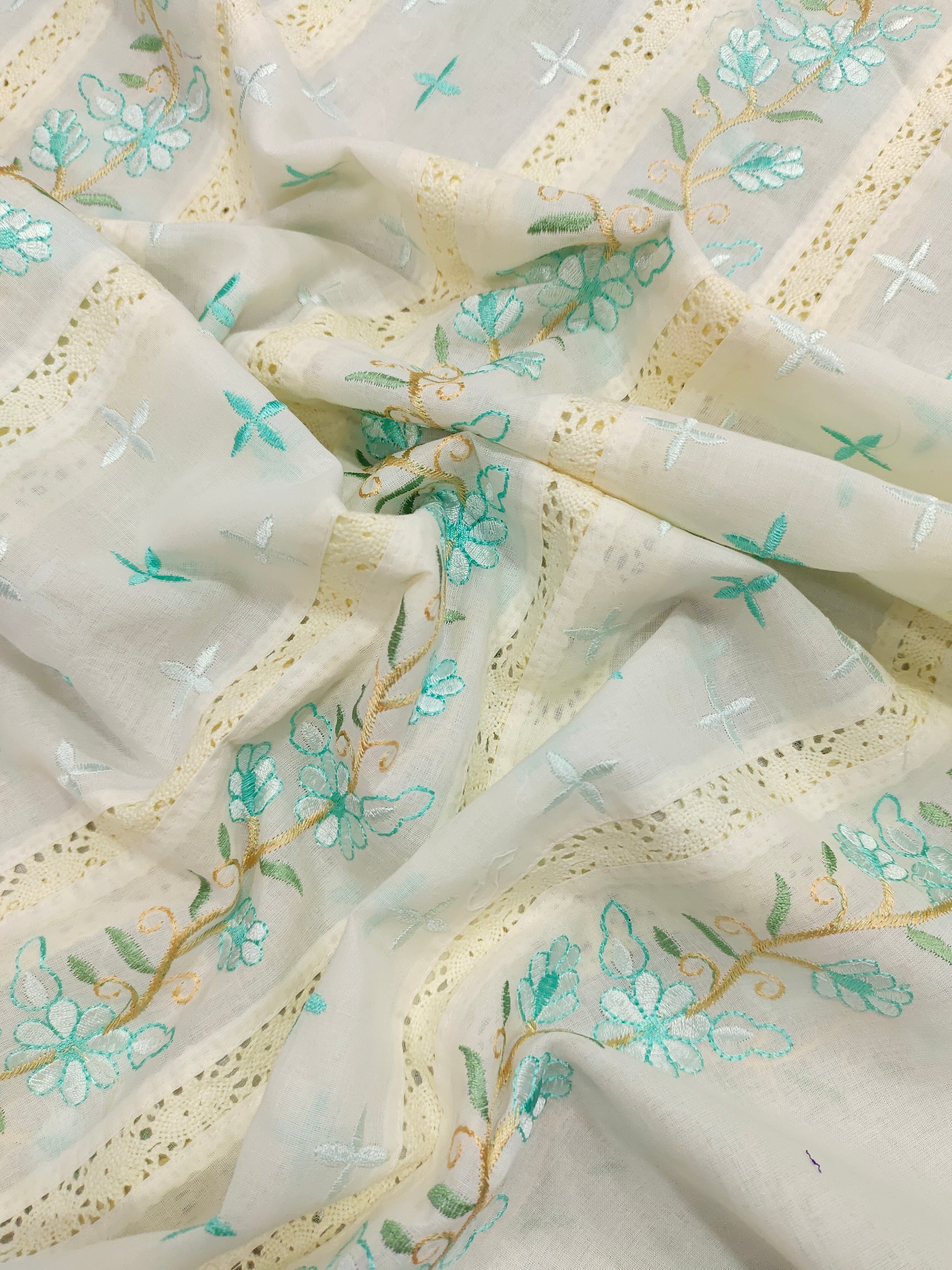 Cream  fabric with pista embroidery and  crochet lace