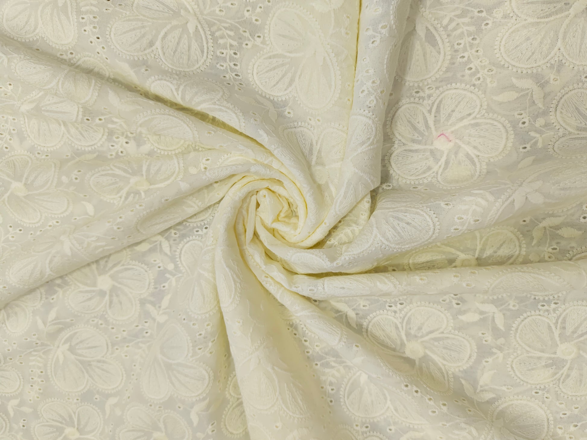 Off white voile with self color embroidery