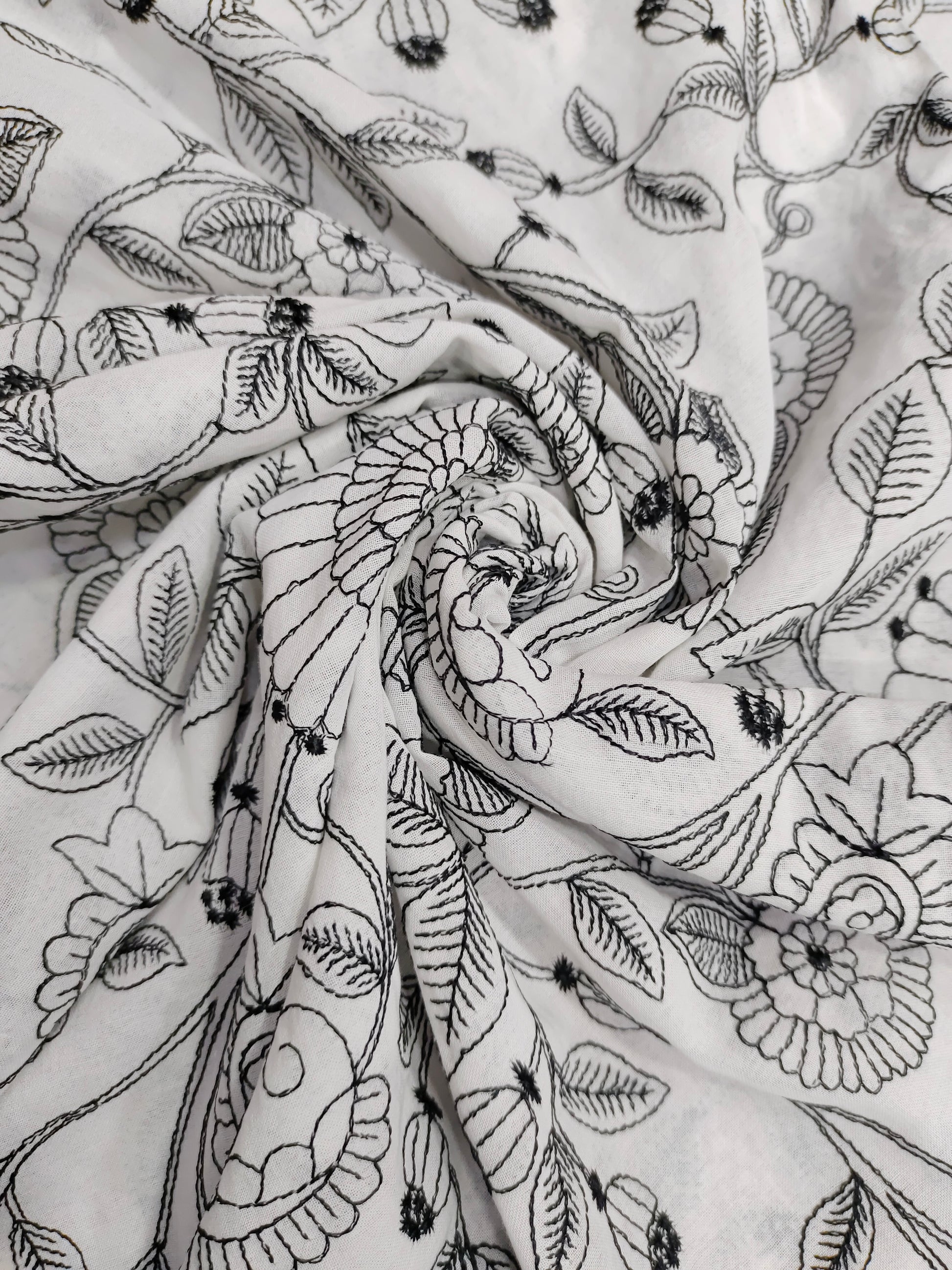 Voile fabric with black embroidery