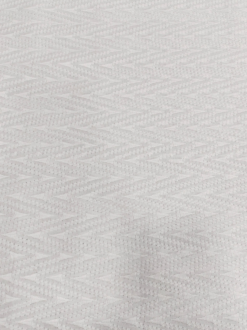 White cotton embroidered fabric