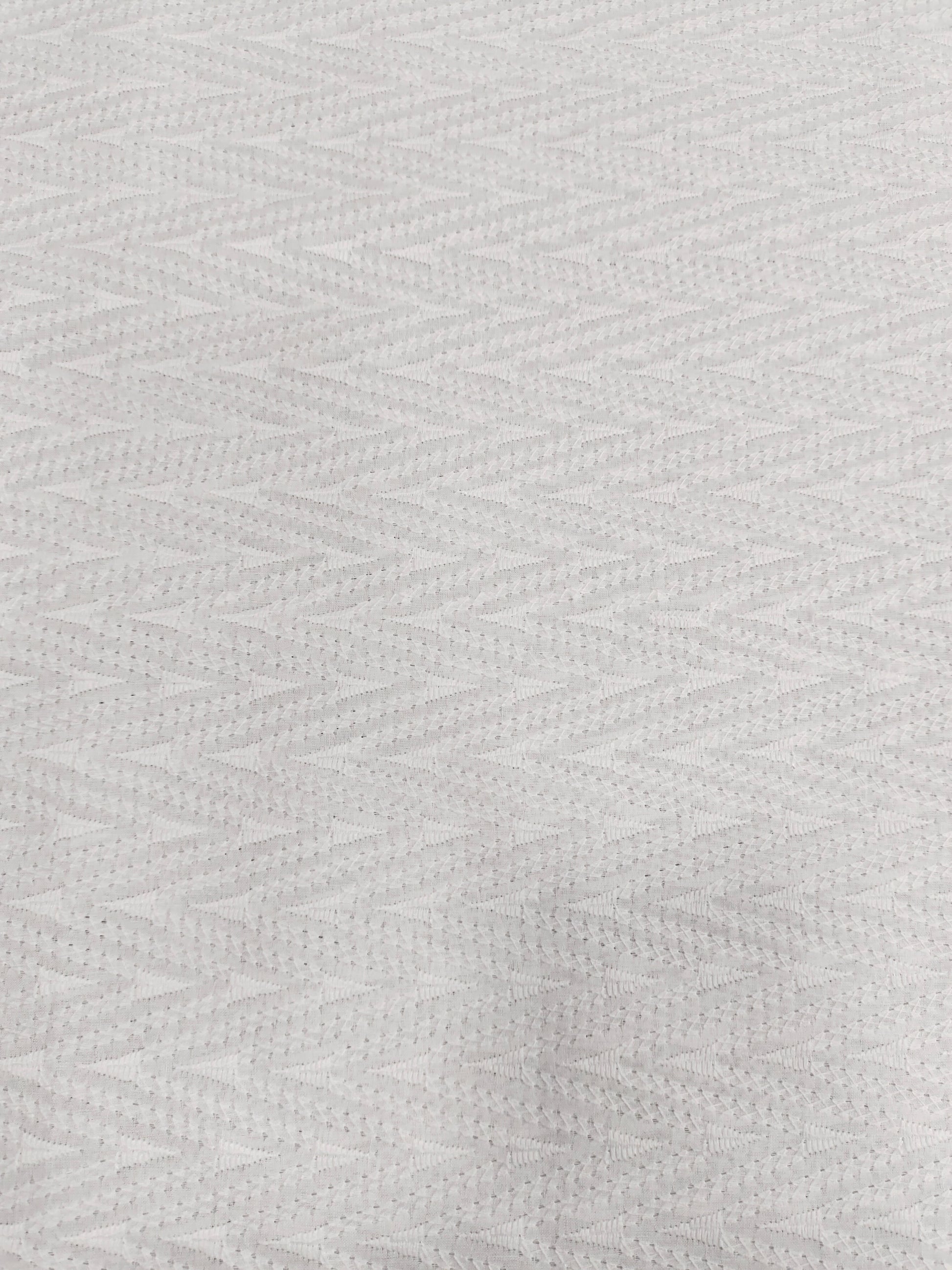 White cotton embroidered fabric