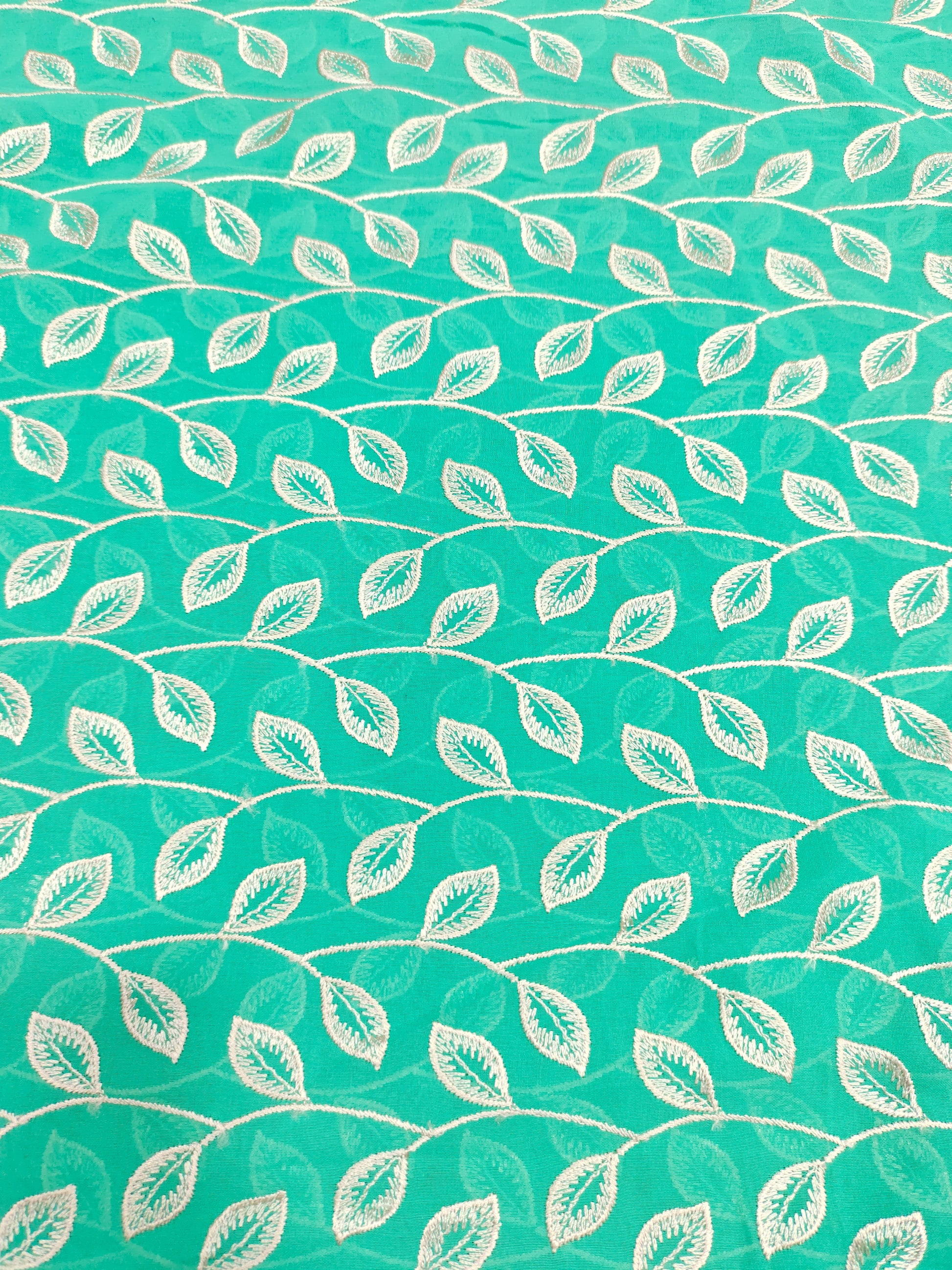 Voile embroidered fabric with beige leaves work