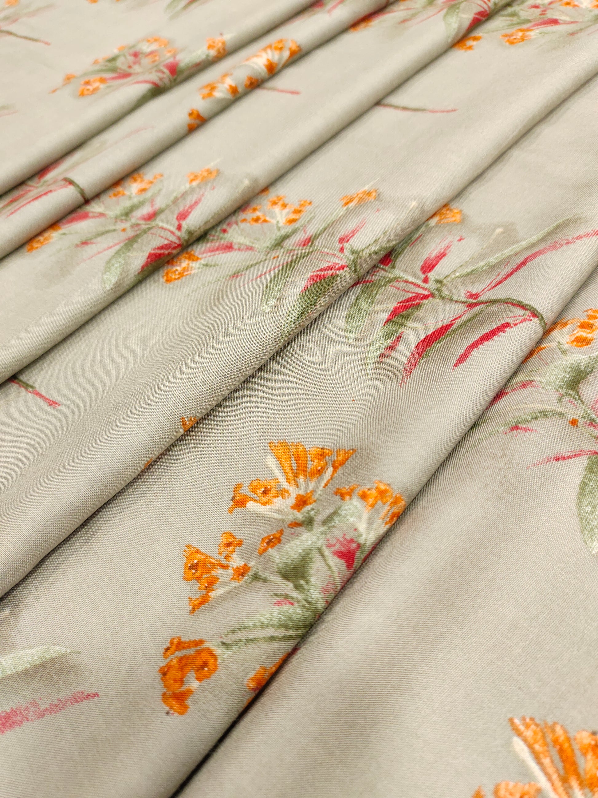 Rayon fabric Grey with orange flowers bunch motifs