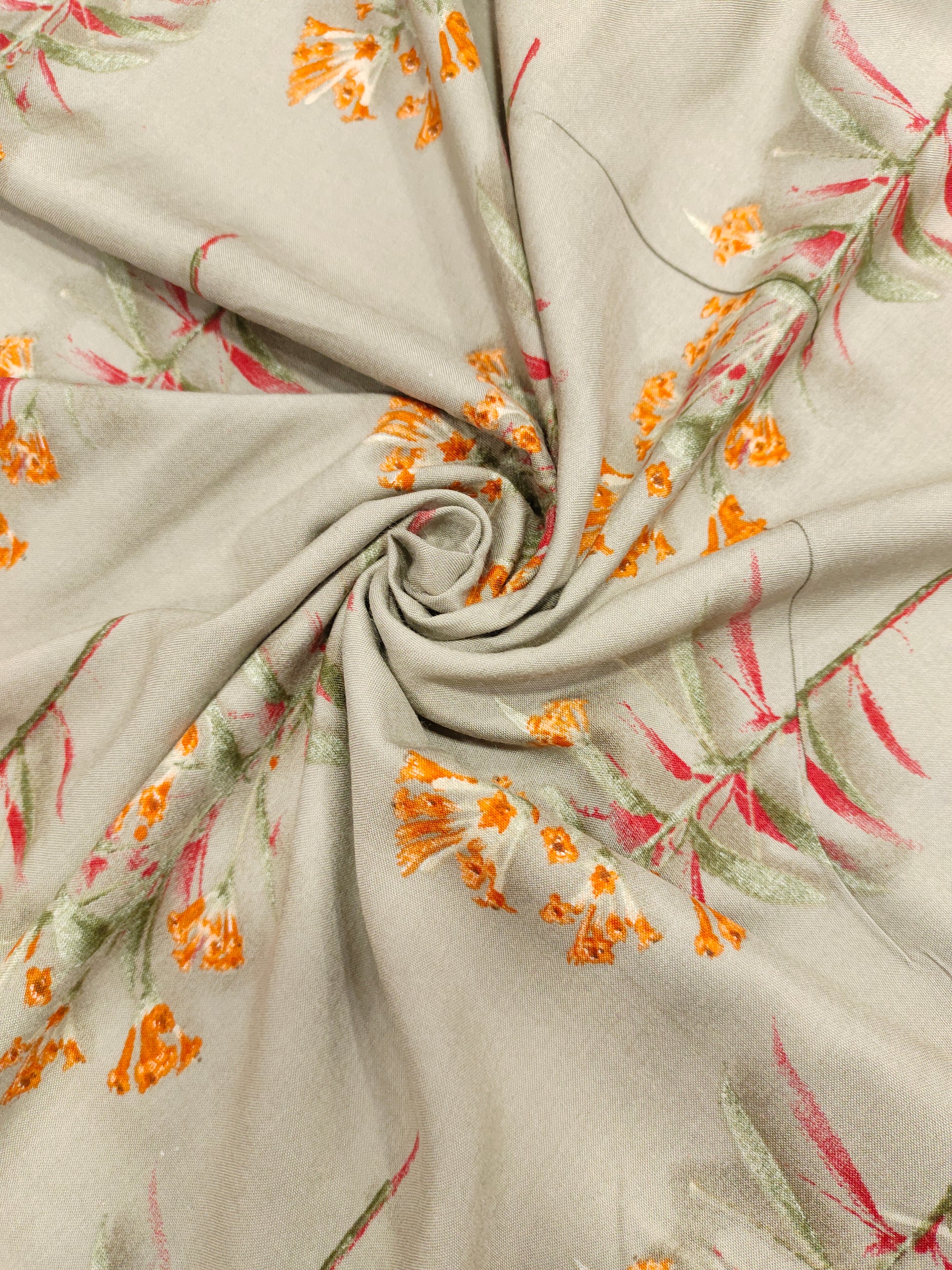 Rayon fabric Grey with orange flowers bunch motifs