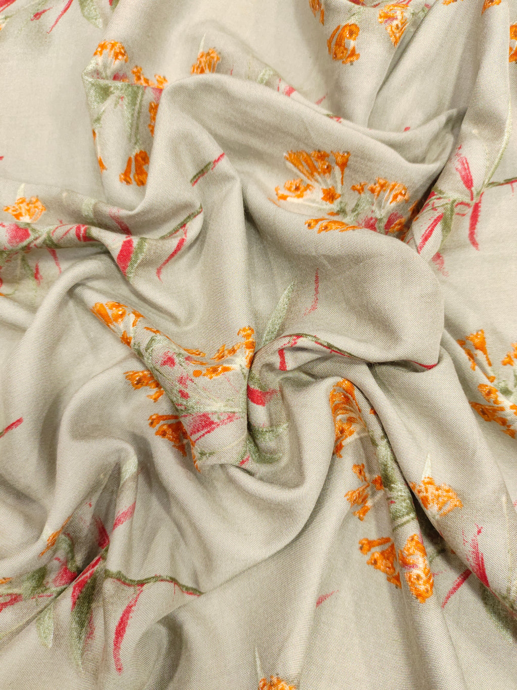 Rayon fabric Grey with orange flowers bunch motifs