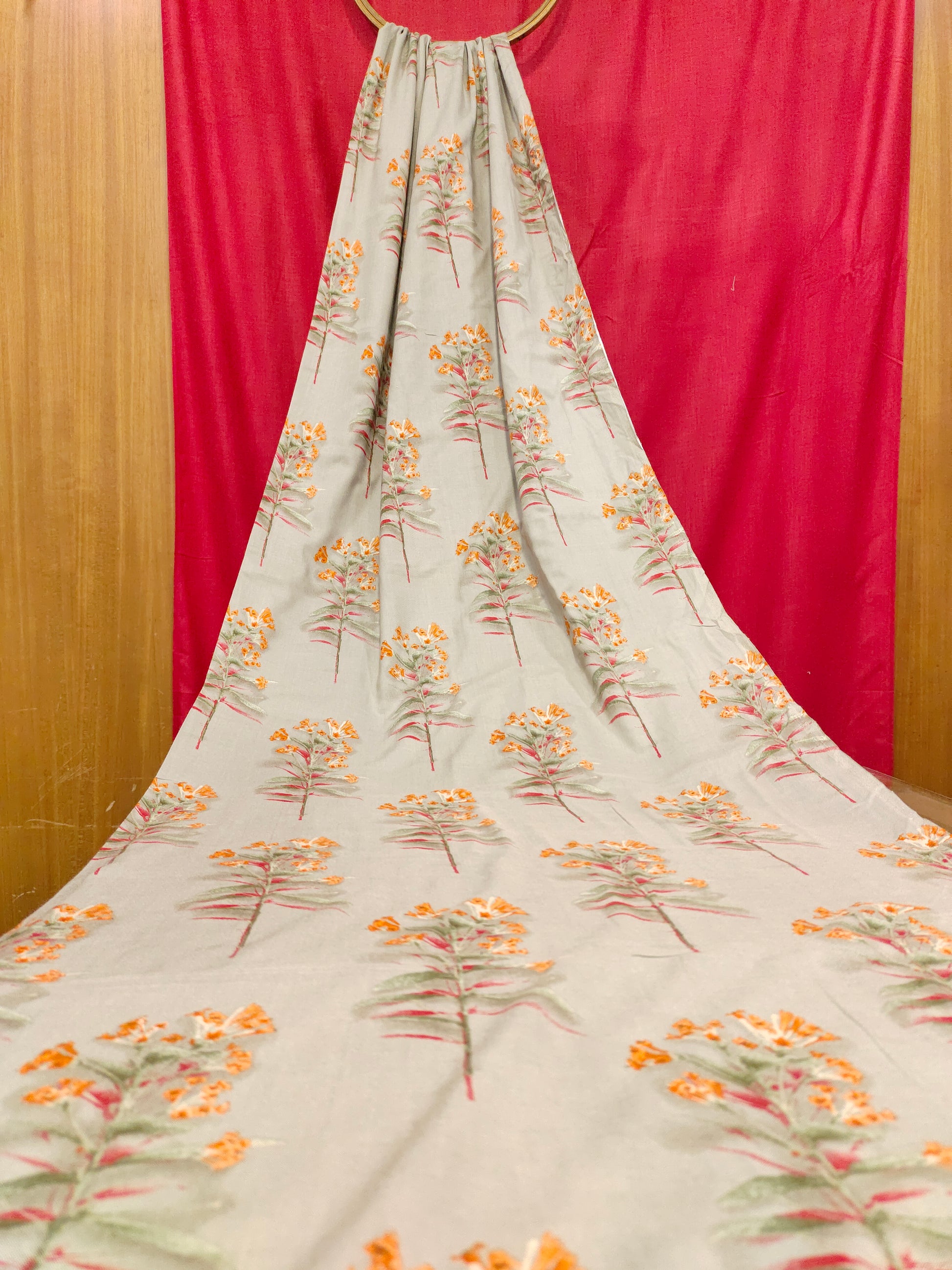 Rayon fabric Grey with orange flowers bunch motifs