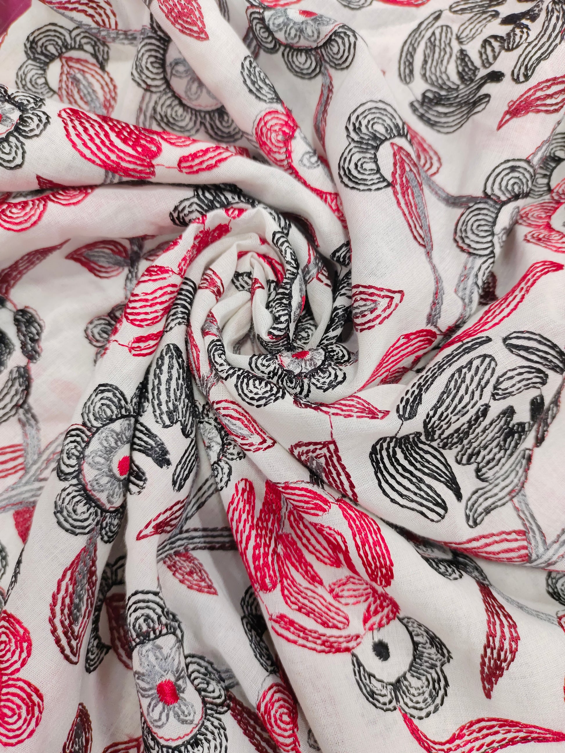 Voile embroidered fabric with red and black