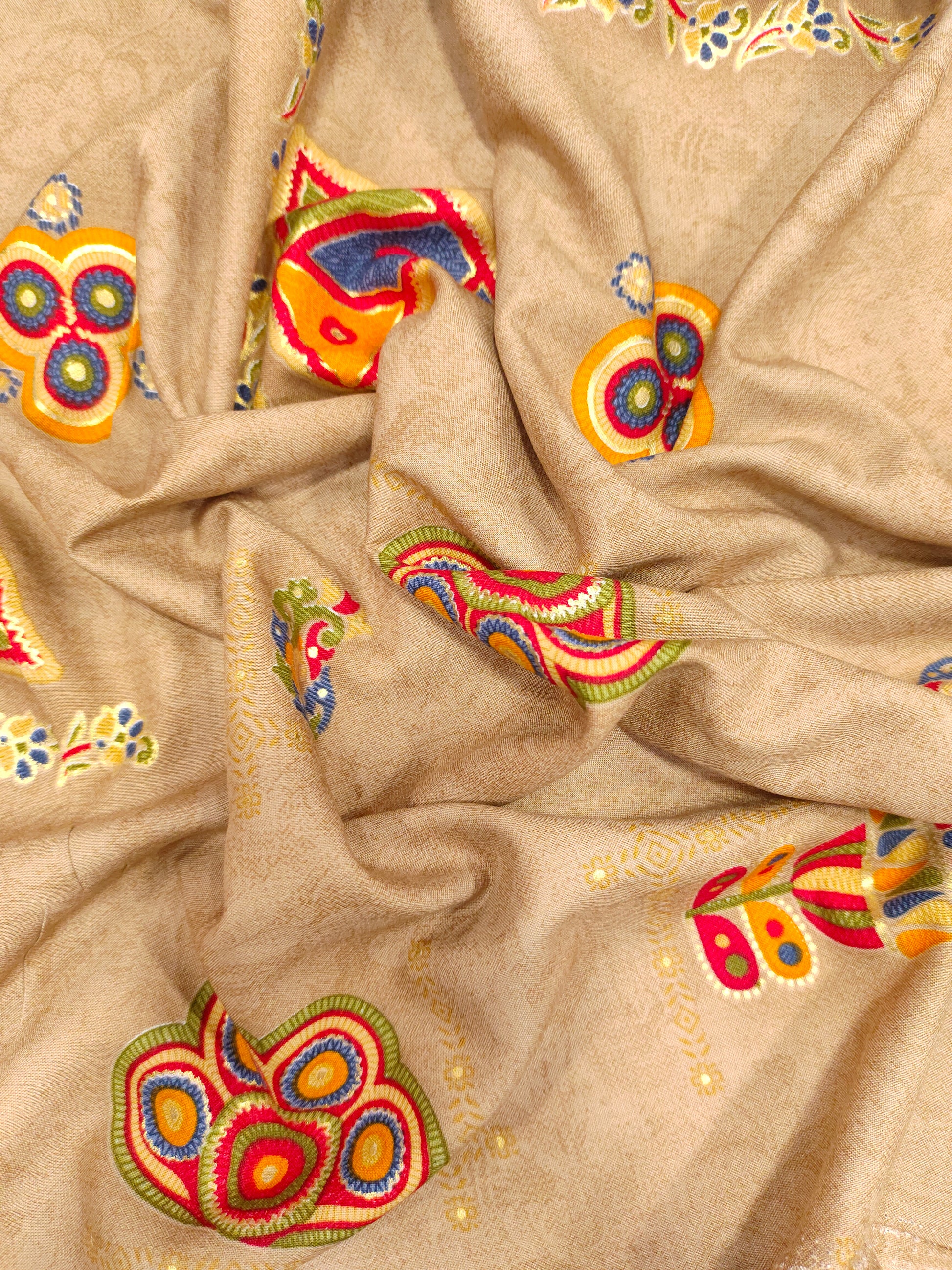 Rayon fabric beige base with different motifs in multicolour