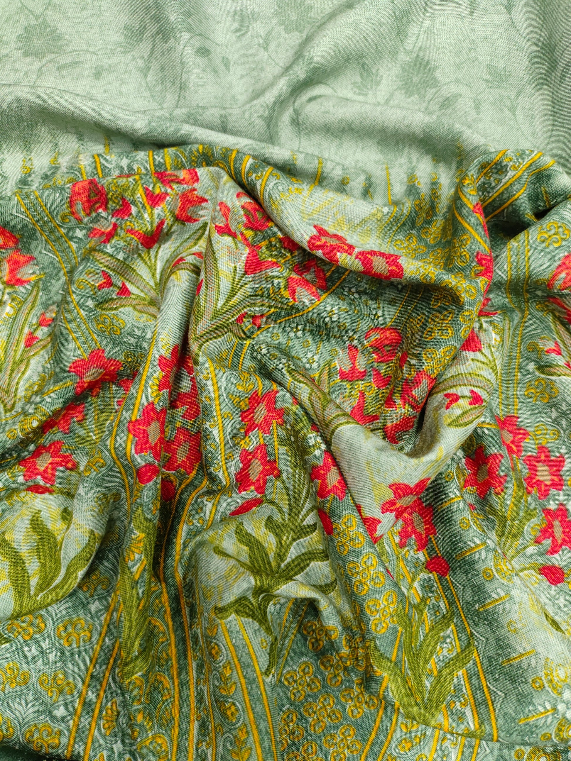 Rayon fabric with daman floral border