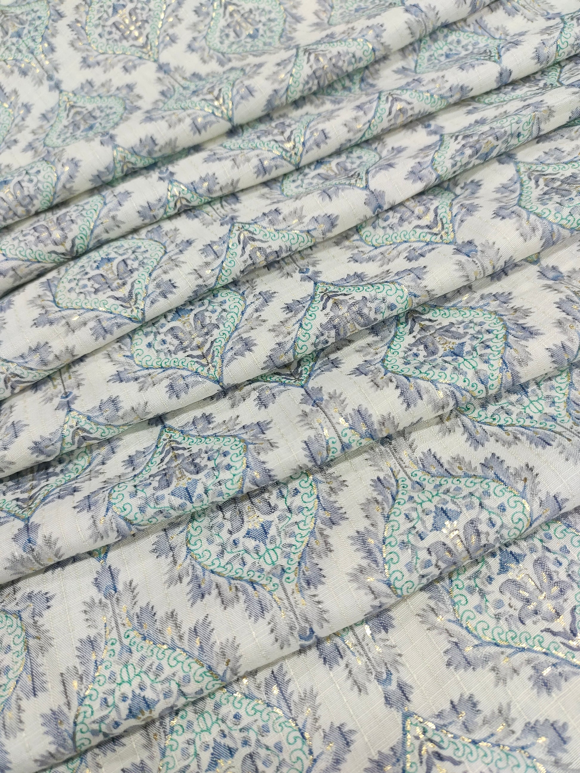 Cream base with green & blue Jeevan Rekha slub foil