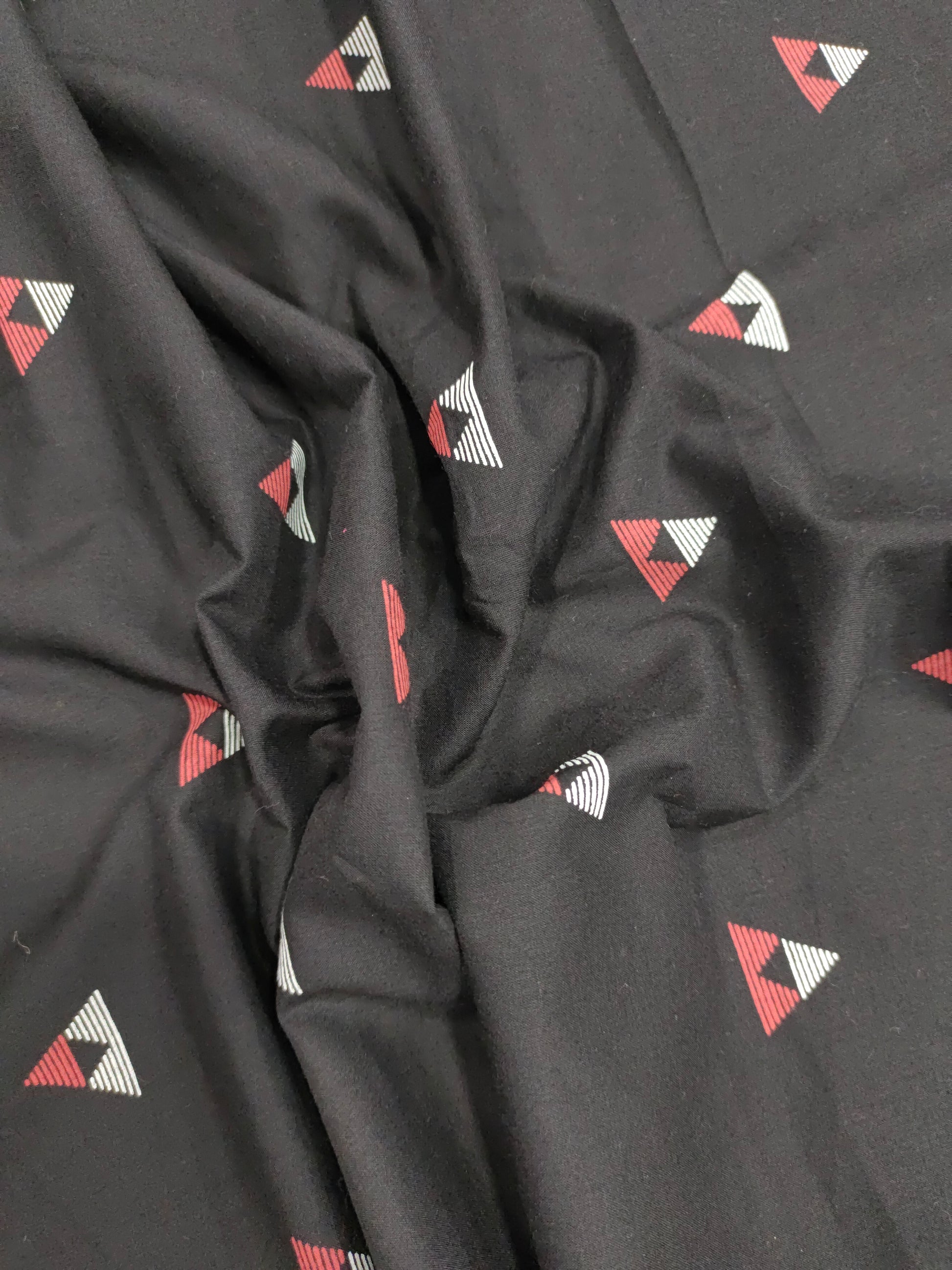 Black cotton fabric triangle print with off white and maroon