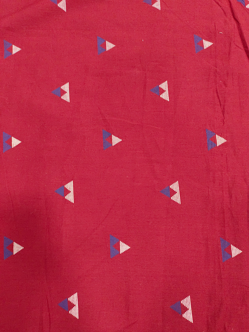 Maroon cotton fabric triangle print with off white and blue