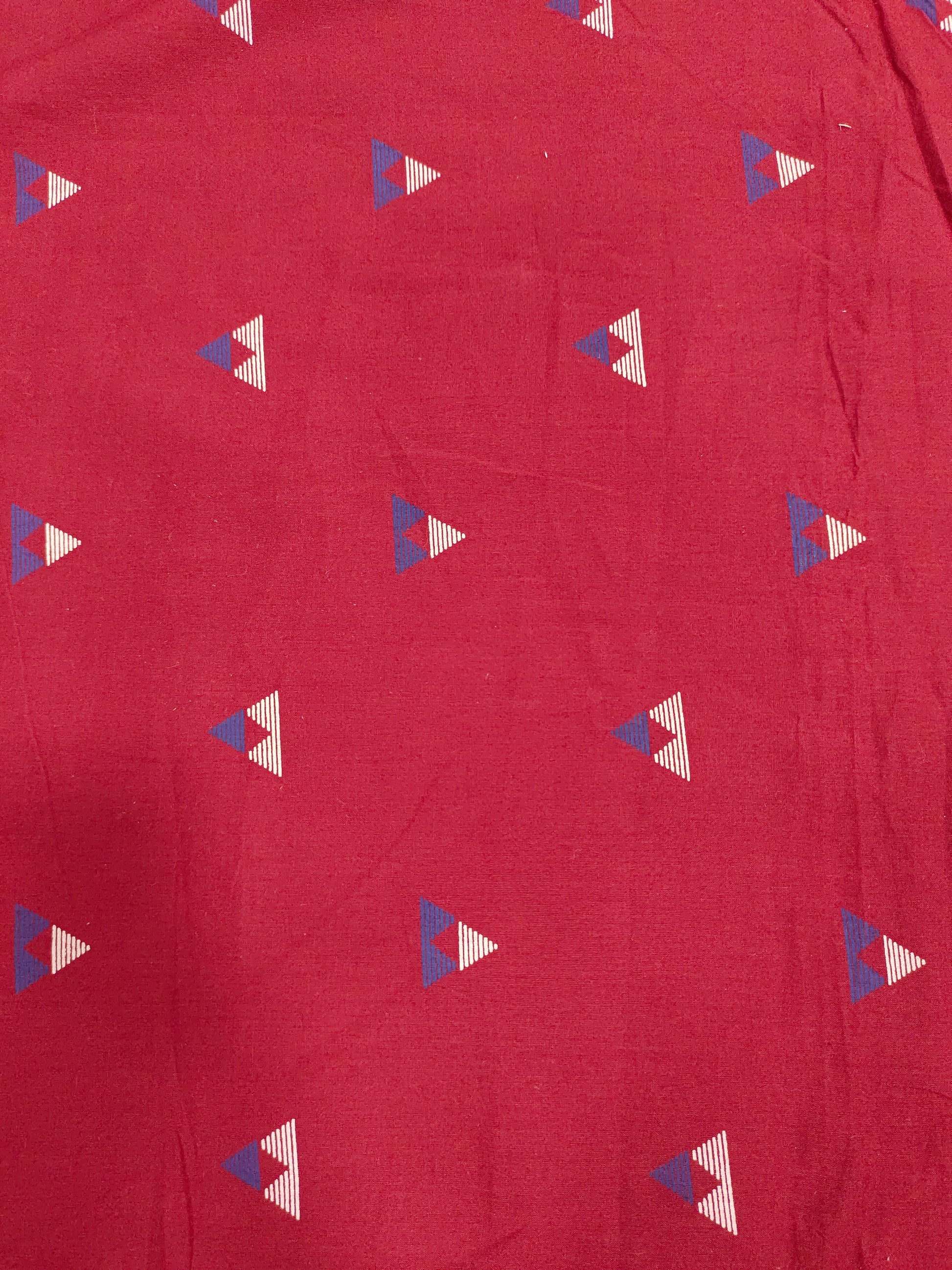 Maroon cotton fabric triangle print with off white and blue