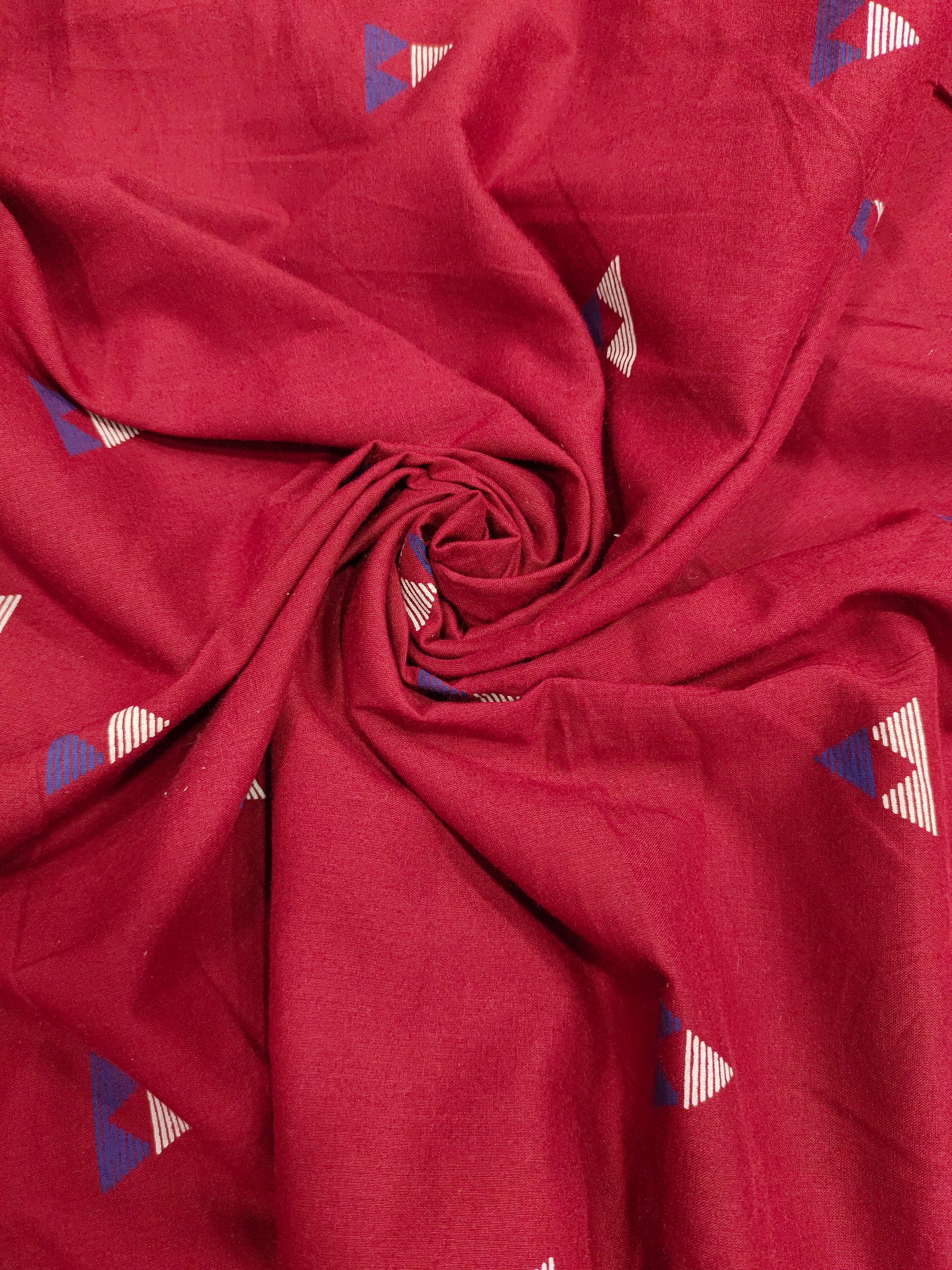 Maroon cotton fabric triangle print with off white and blue