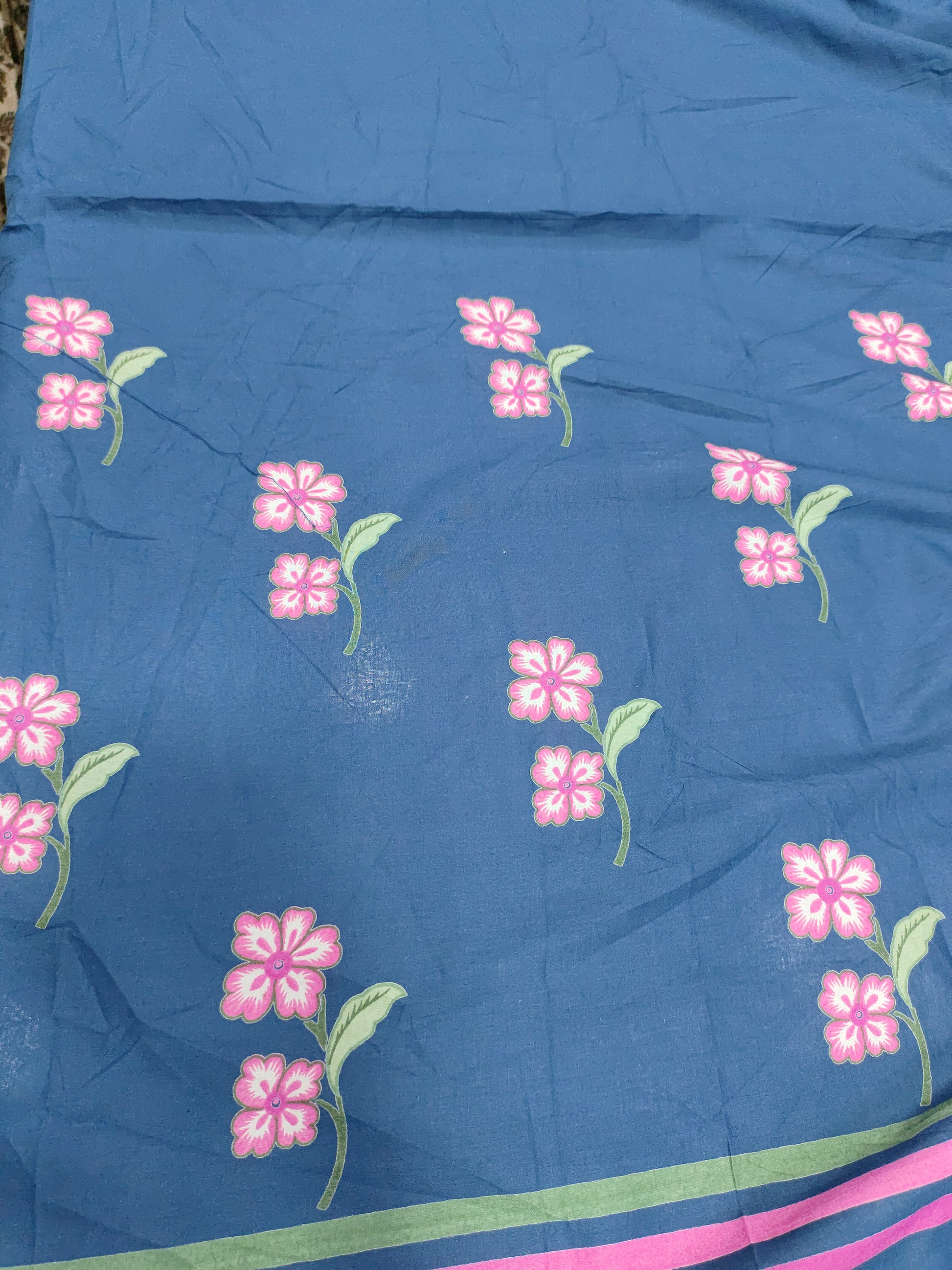 Jaipur cotton daman print wink on blue fabric