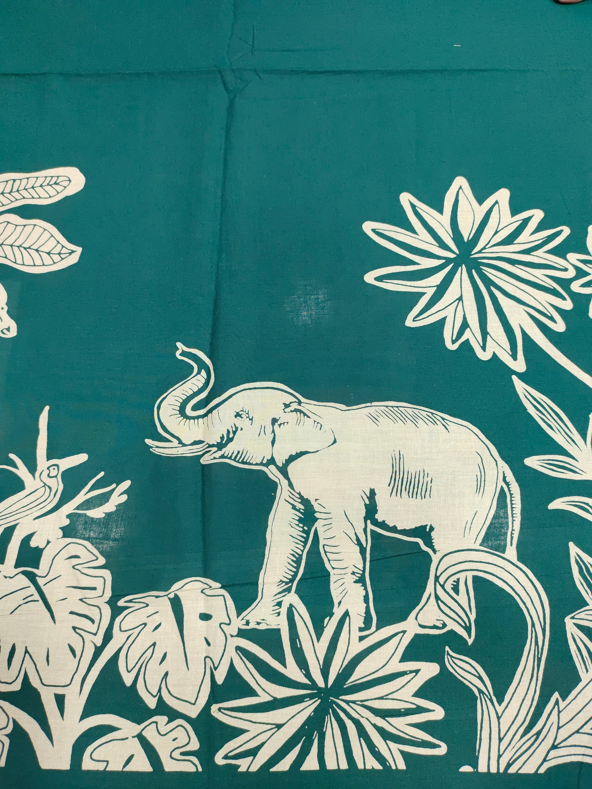 Jaipur cotton daman print on bottle green fabric