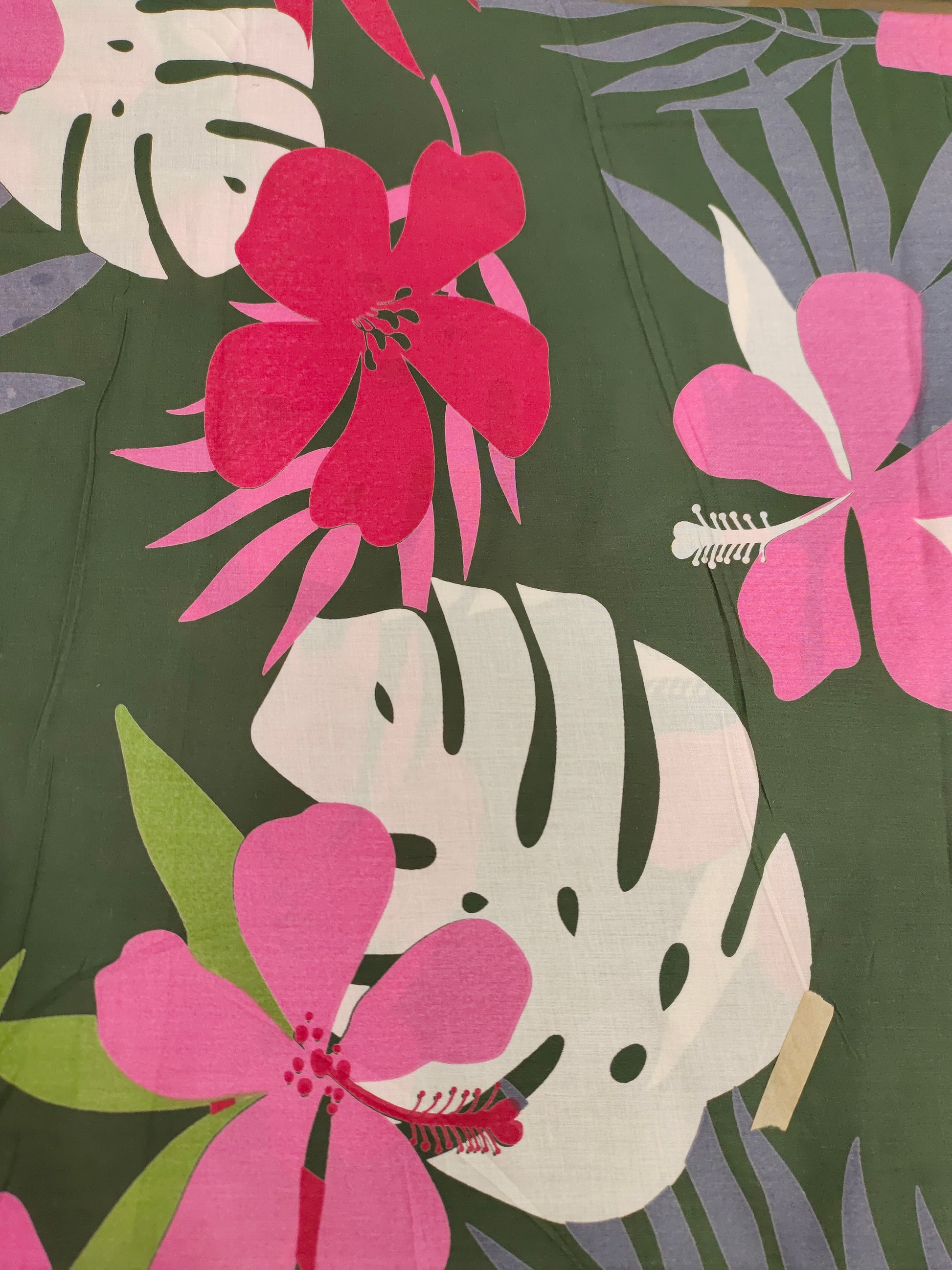 Cotton big floral print on olive green fabric
