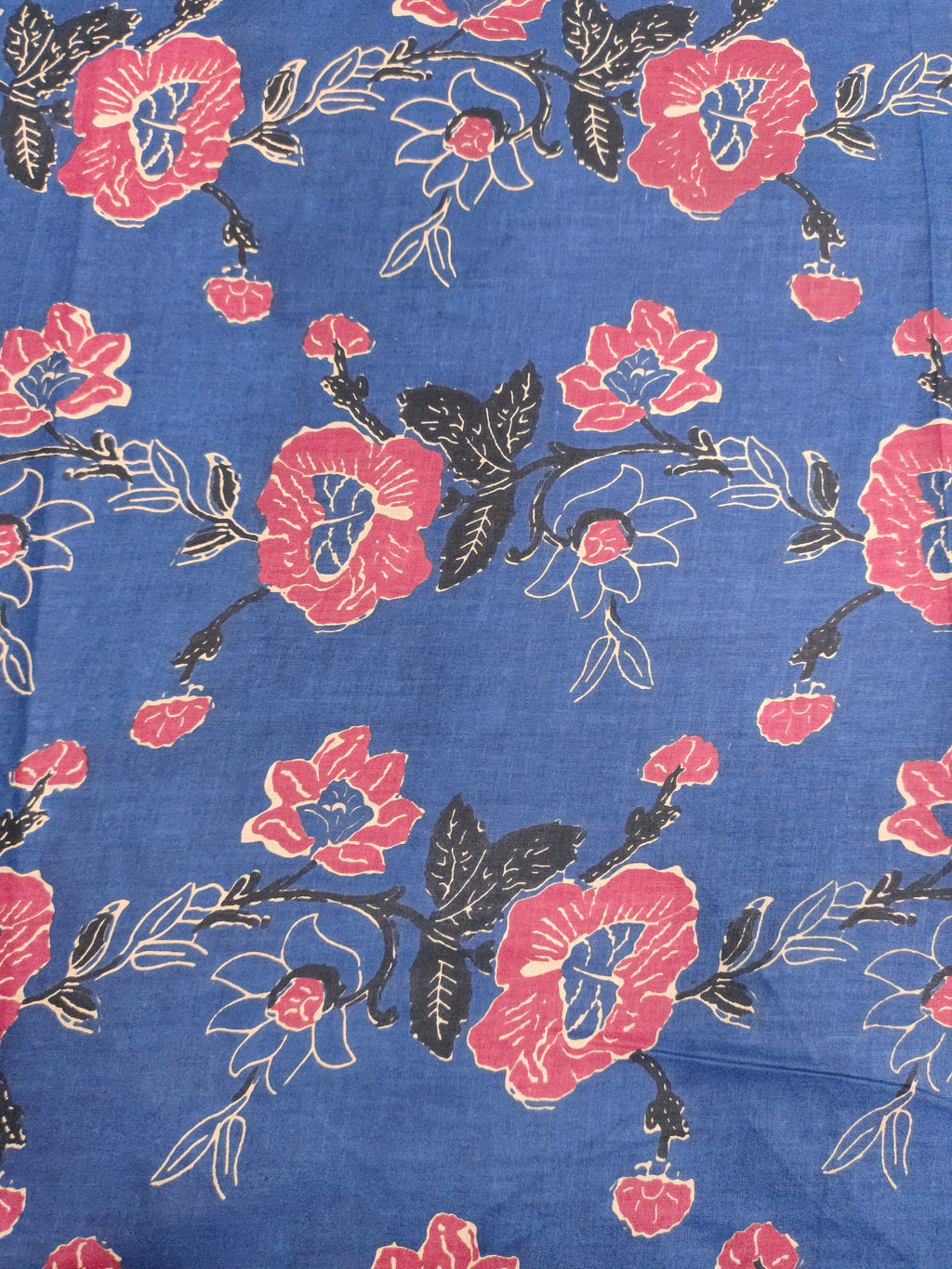 Navy base with rust floral cotton screen print