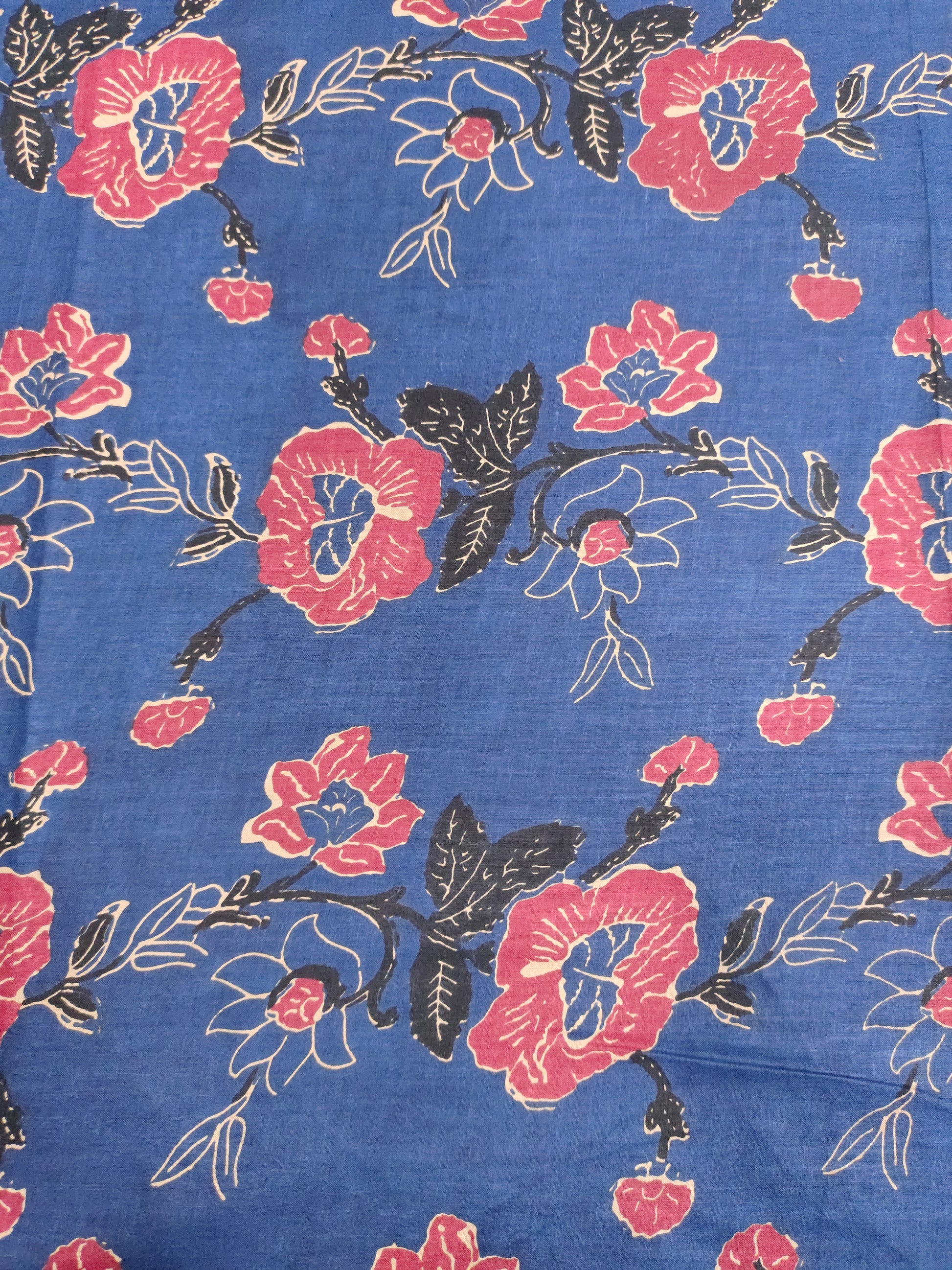 Navy base with rust floral cotton screen print