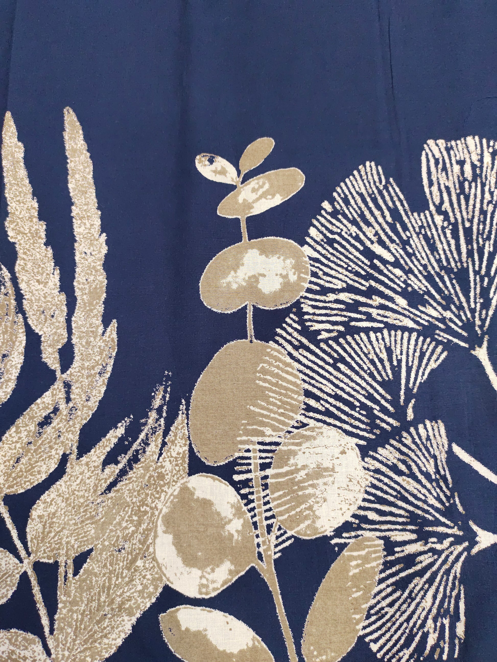 Cotton daman screen print blue fabric with beige floral print.