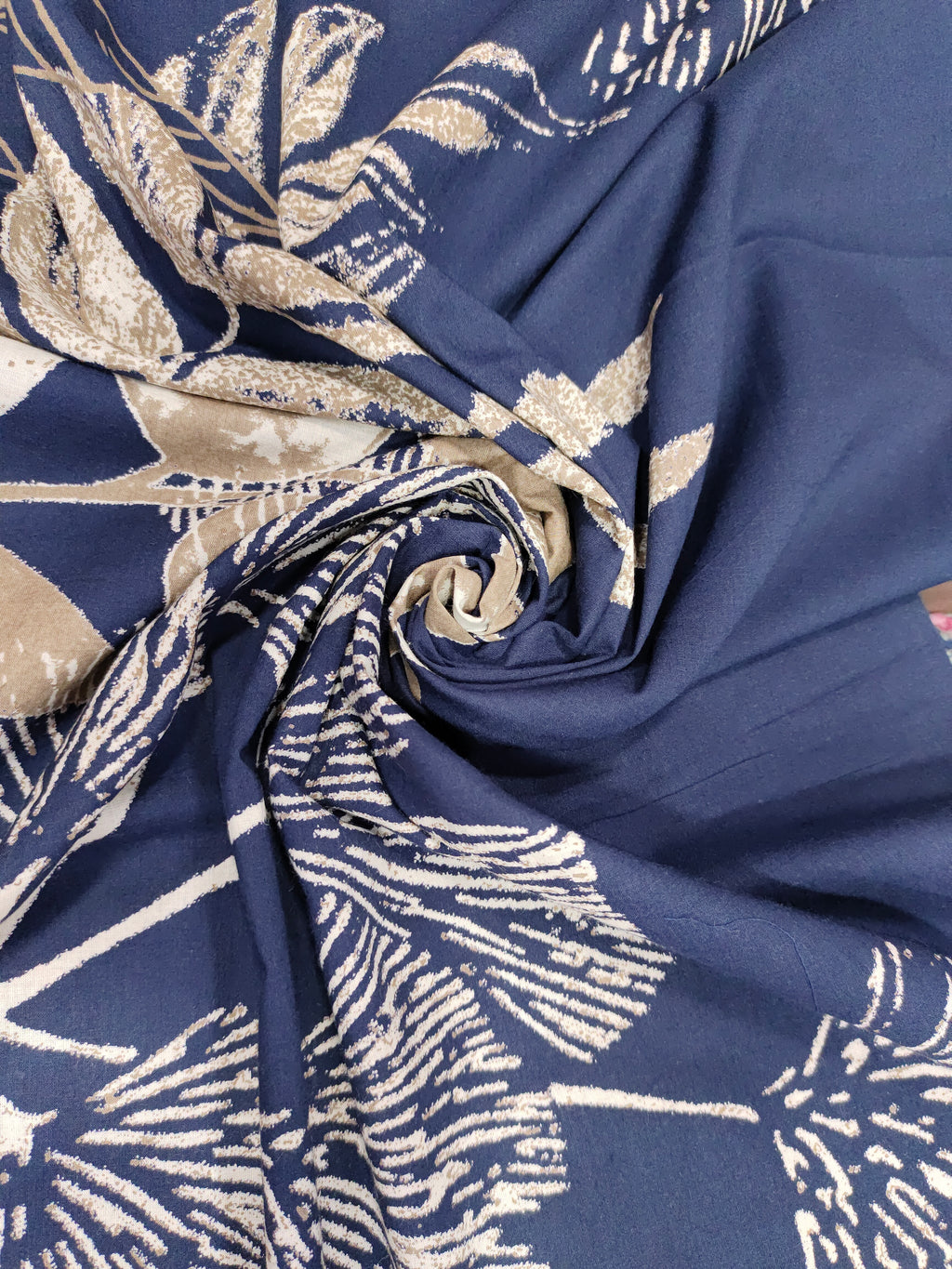 Cotton daman screen print blue fabric with beige floral print.