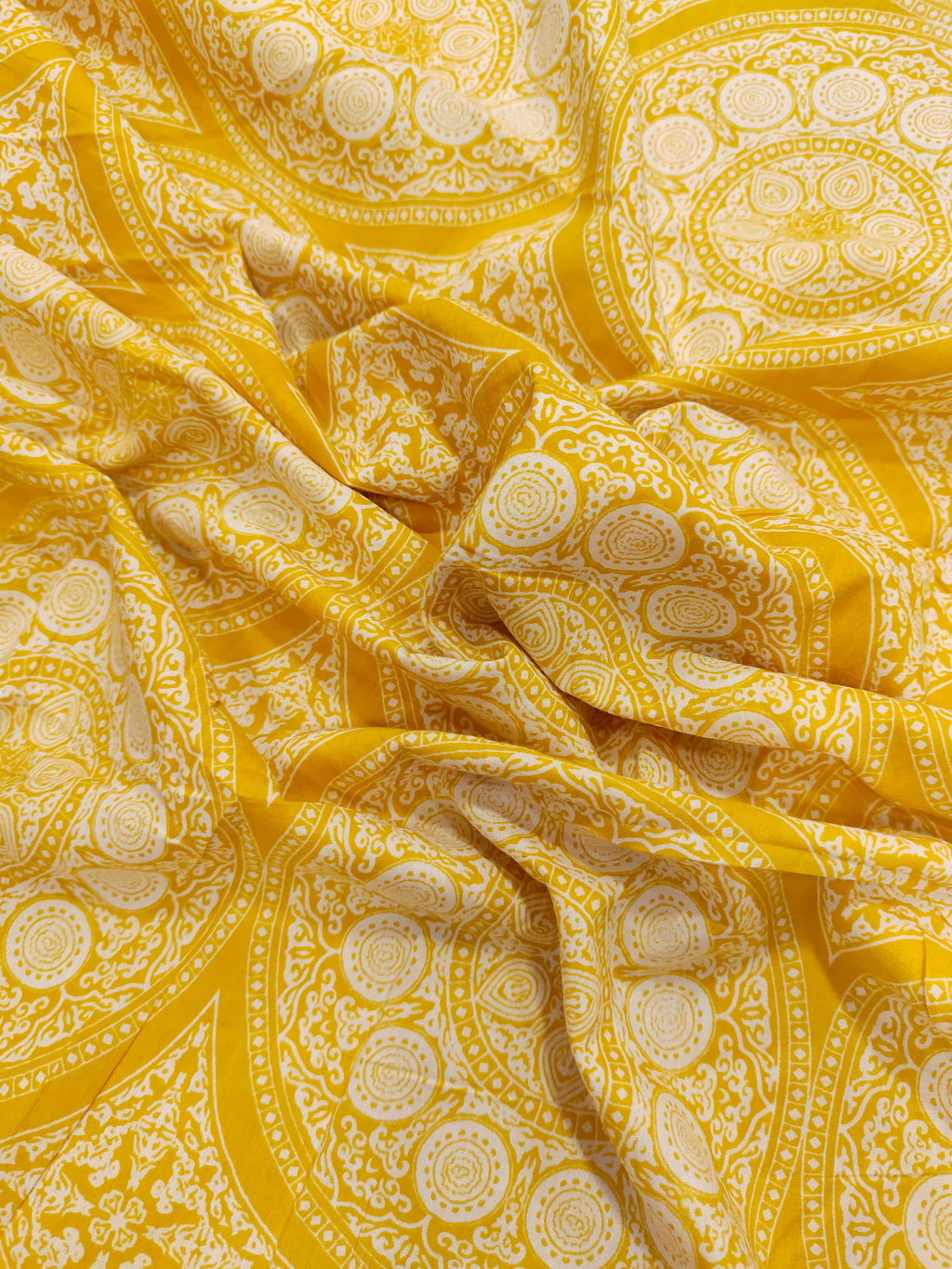 Yellow circular cotton printed