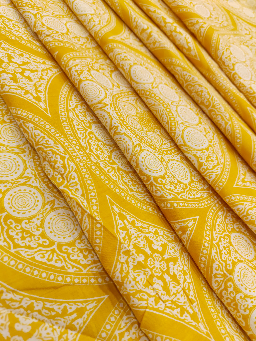 Yellow circular cotton printed
