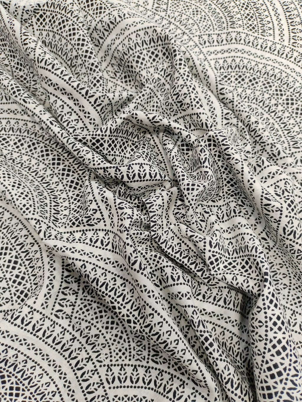 White with black print cotton fabric
