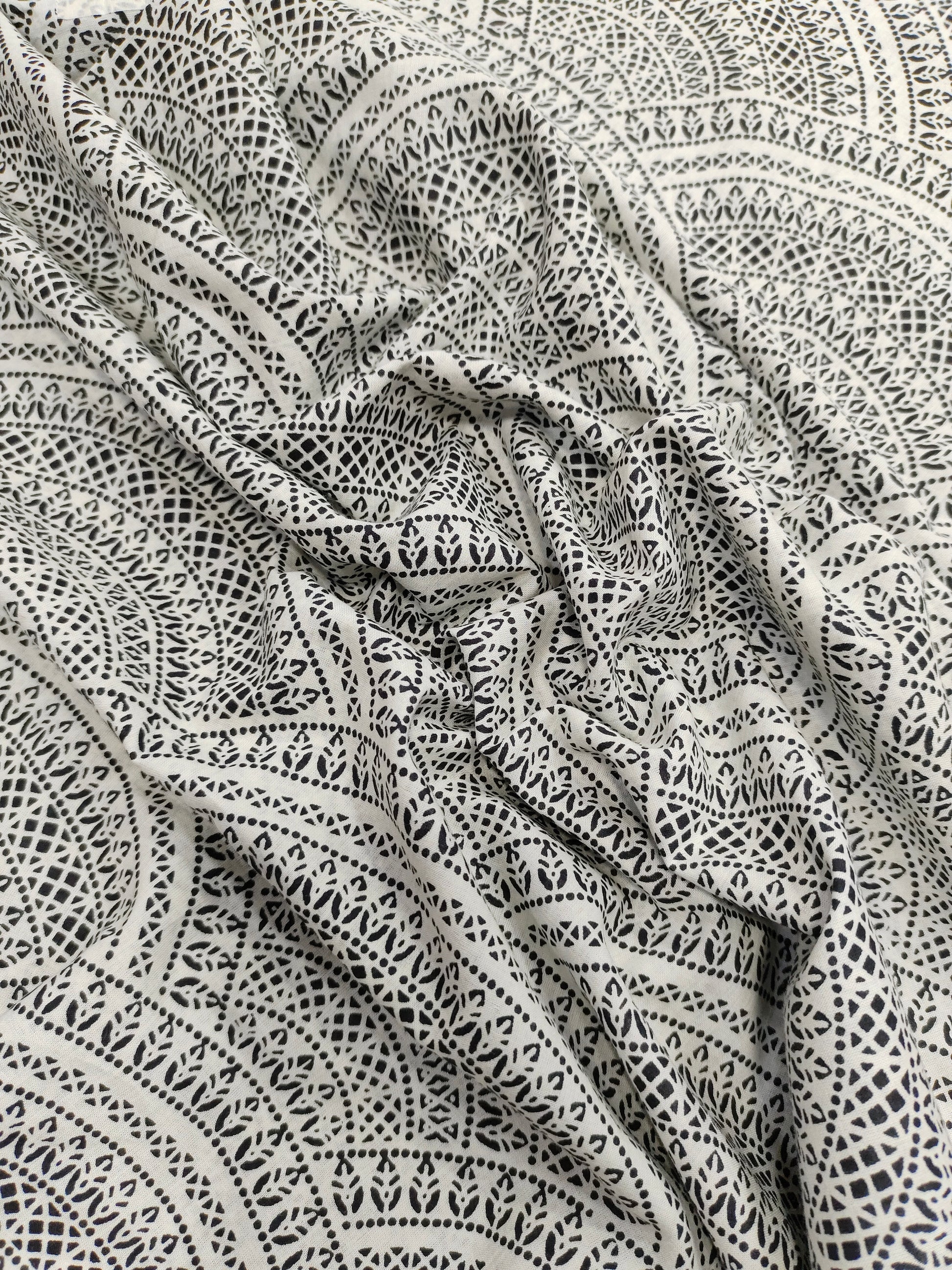 White with black print cotton fabric