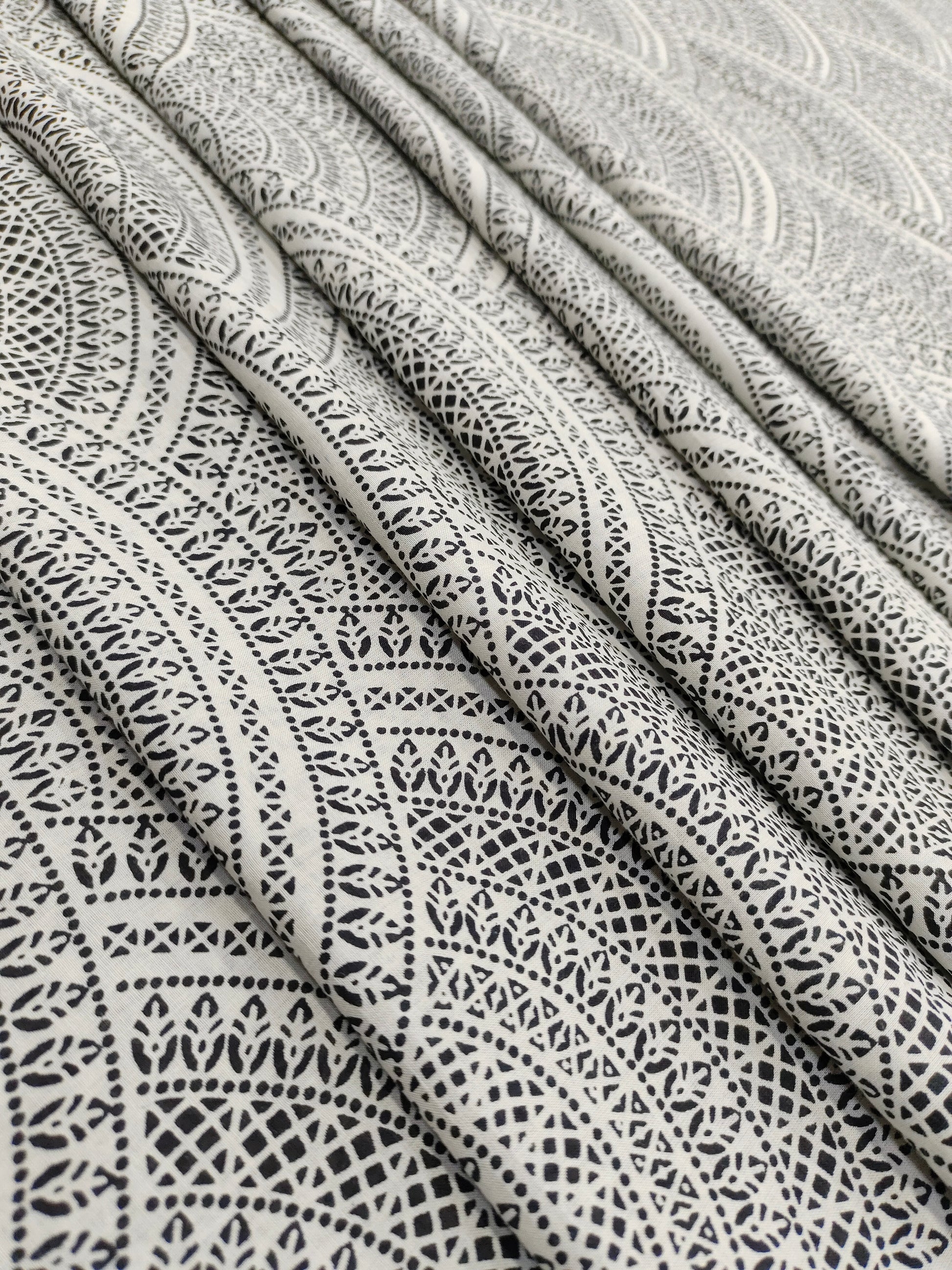 White with black print cotton fabric