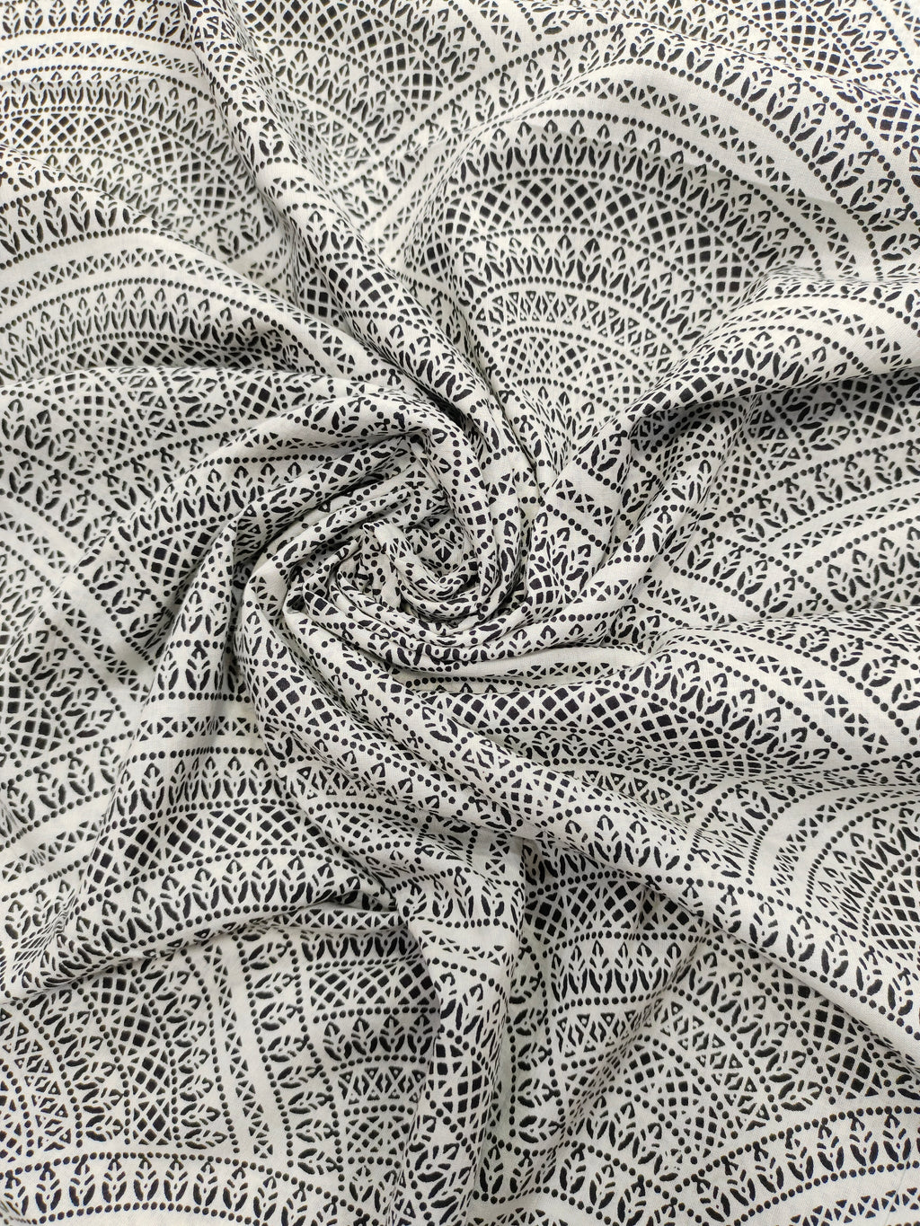White with black print cotton fabric