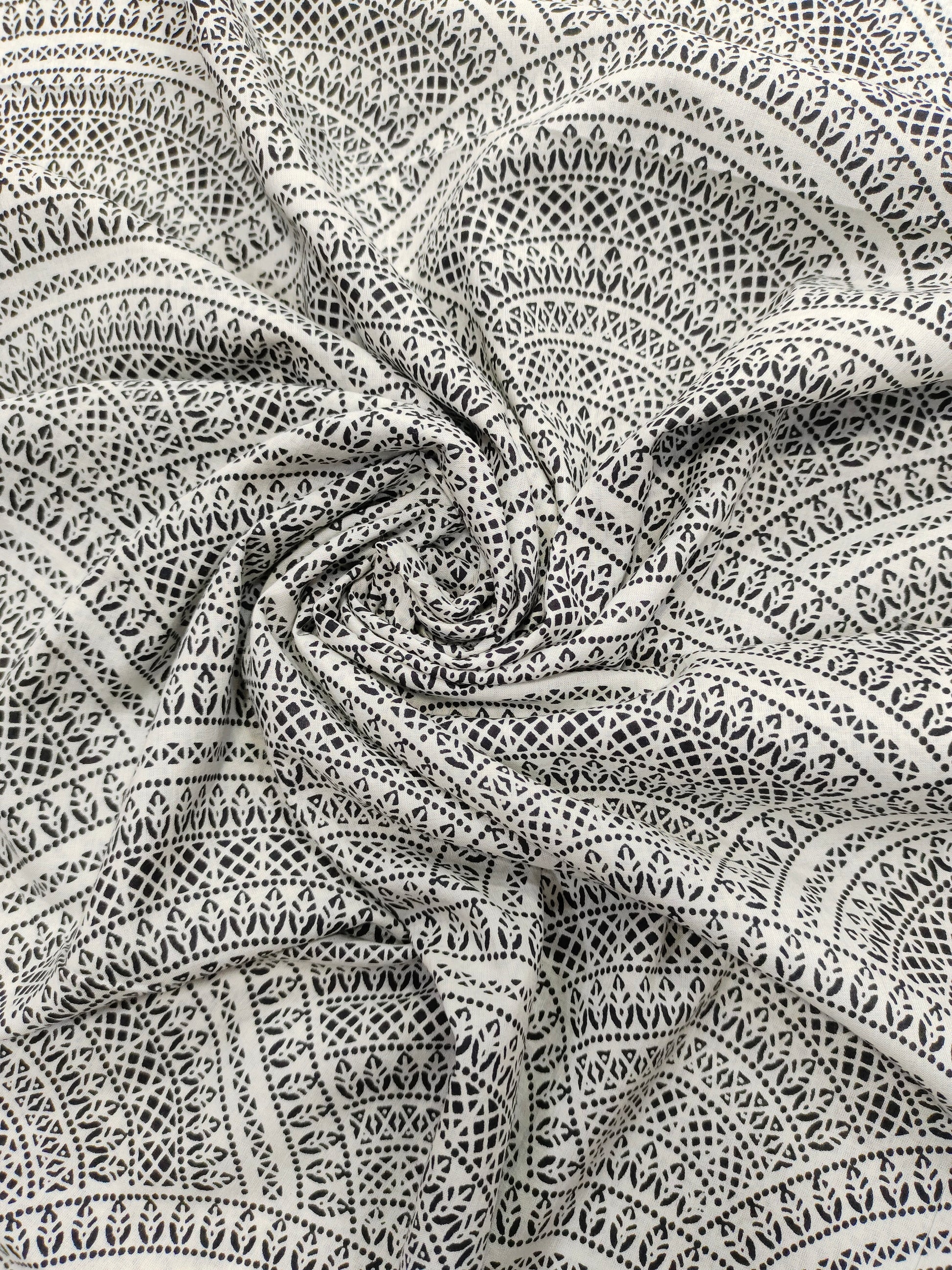White with black print cotton fabric