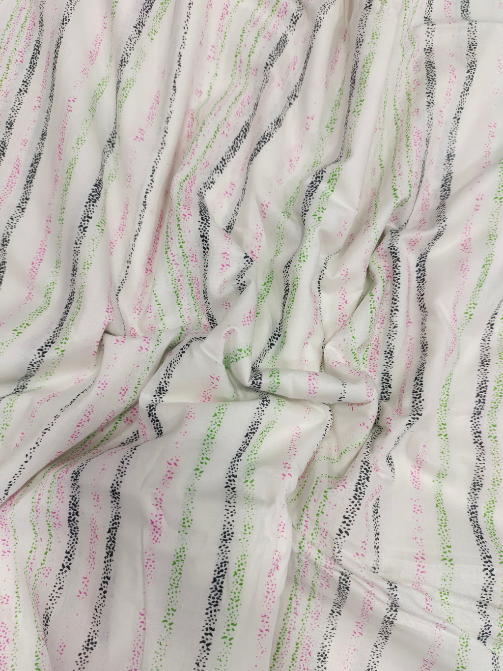 White cotton stripes with pink black green hand block print.