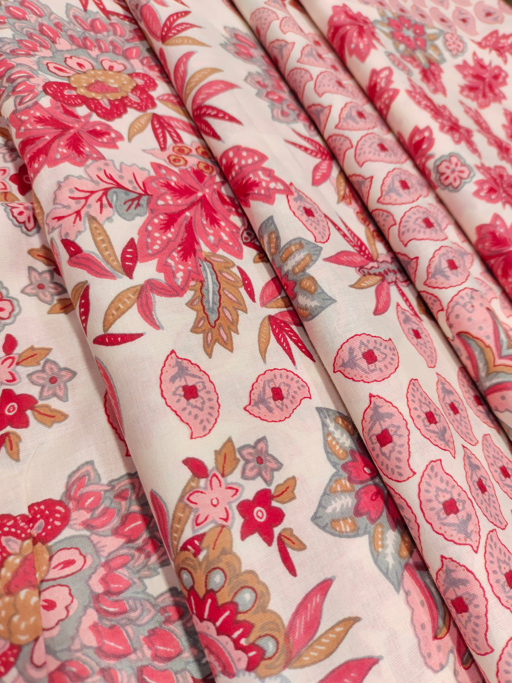 cotton screen print all over with red pink and grey.