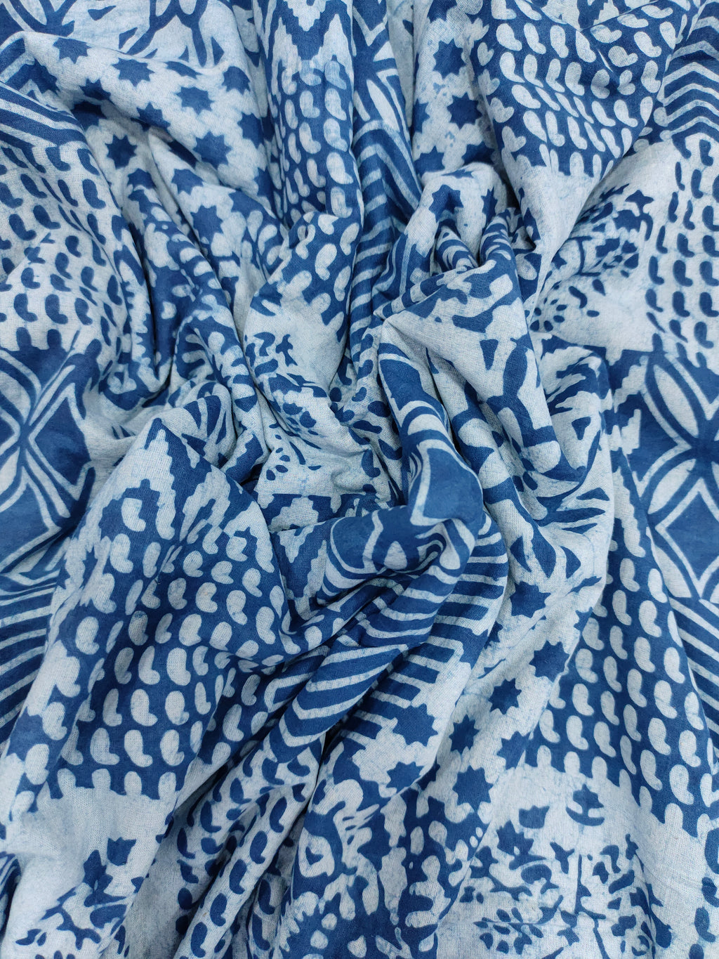 Indigo daboo hand blockrint with different designs.