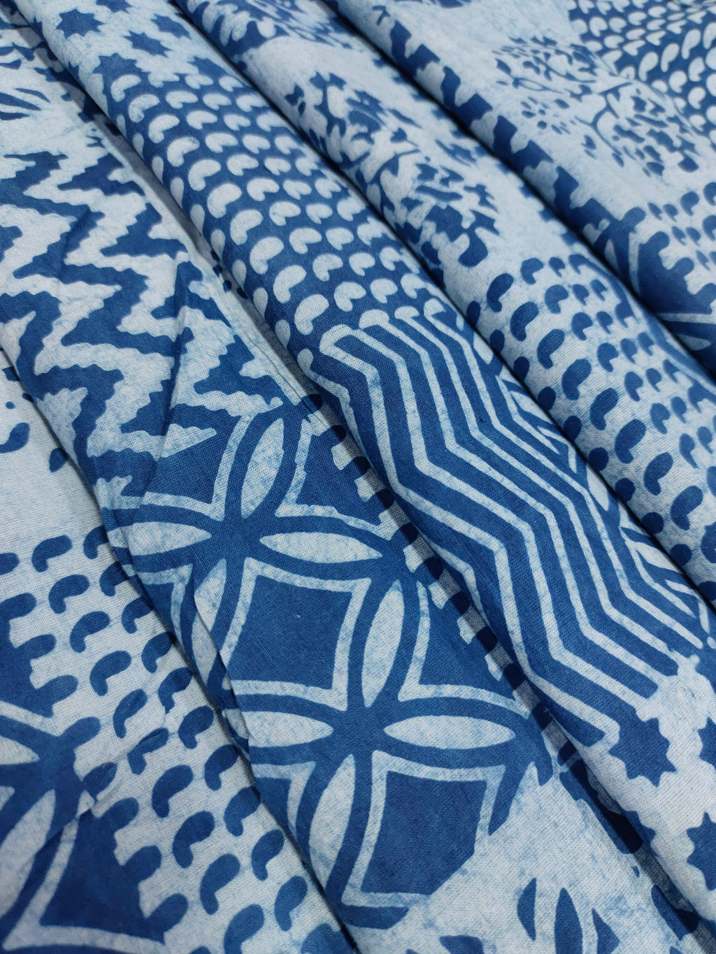 Indigo daboo hand blockrint with different designs.