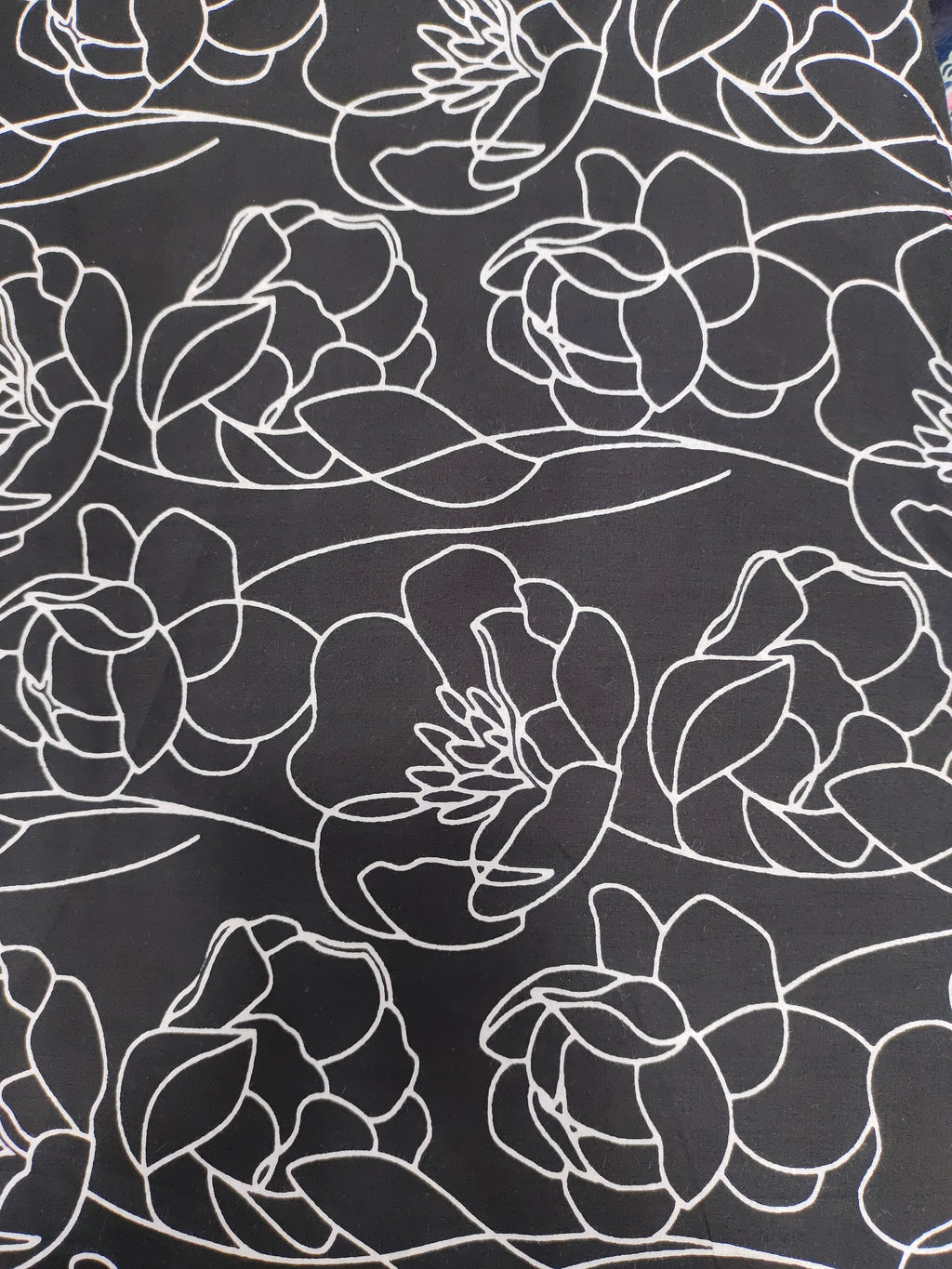 Black screen print with big flowers.