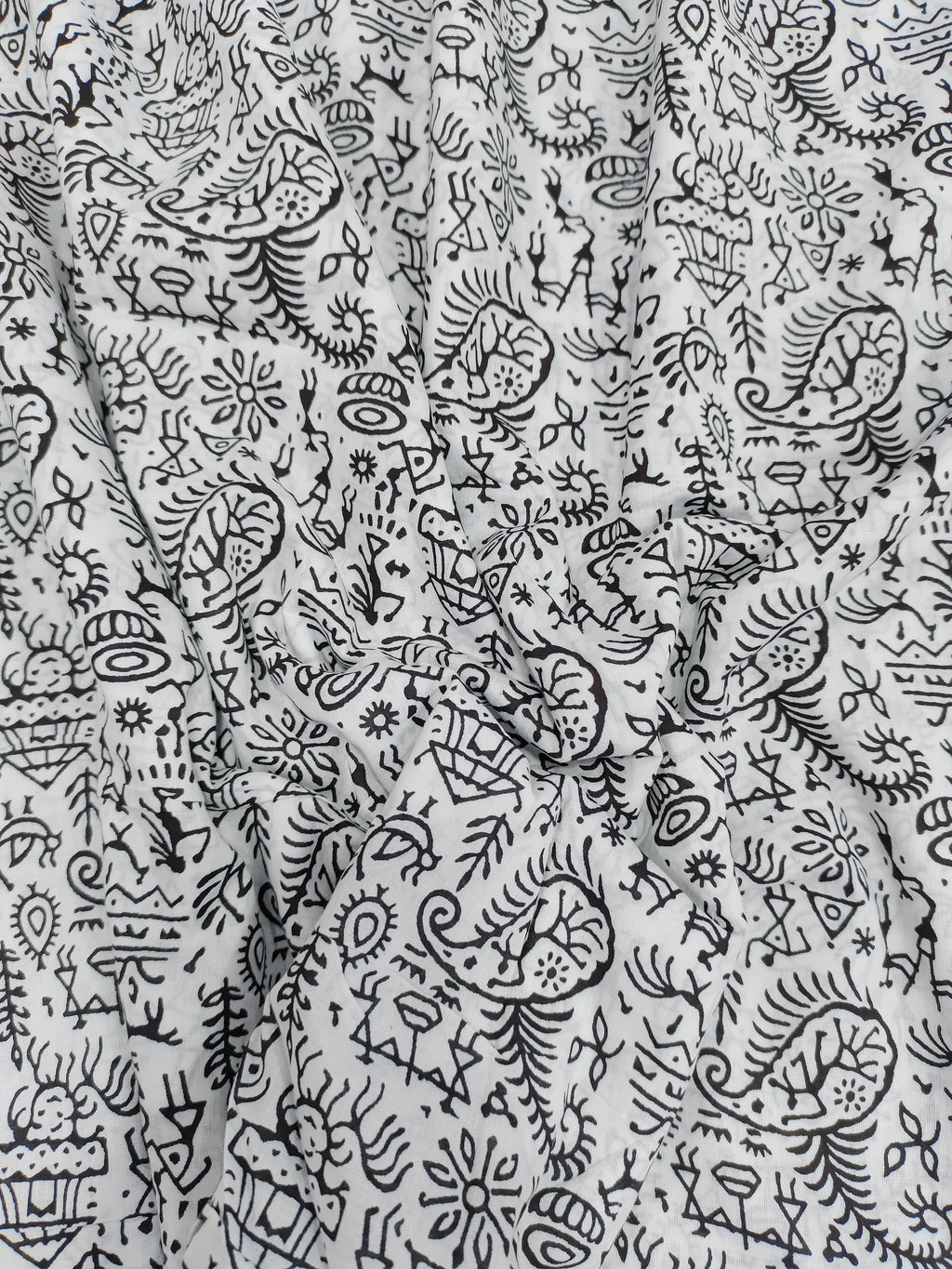 White and black allover screen print.