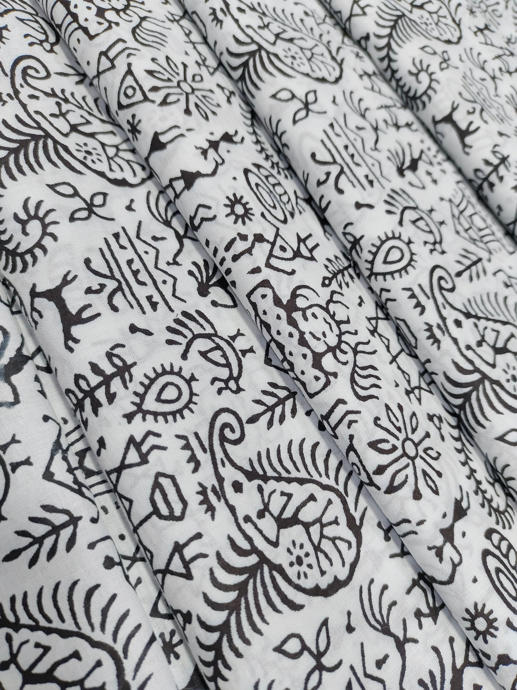 White and black allover screen print.